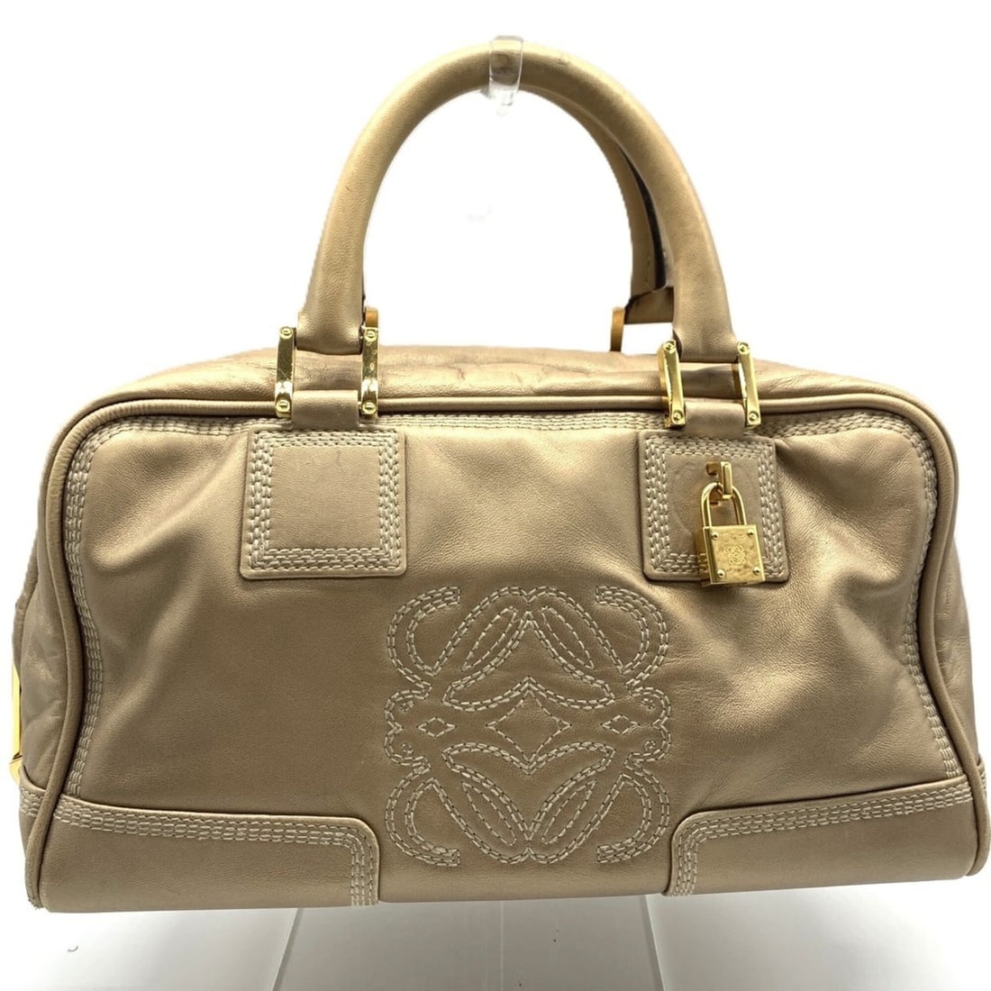 Loewe Amazona 28 Handbag Mini Boston Leather Gold LOEWE: --- Catalog ---Category: SizeSize (HxWxD): 15.5cm x 28.5cm x 13.5cm / 6.1'' x 11.22'' x 5.31''Category: DesignType: HandbagColor: GoldGender: WomenMaterial: Leather Category: GeneralBrand: Loewe---