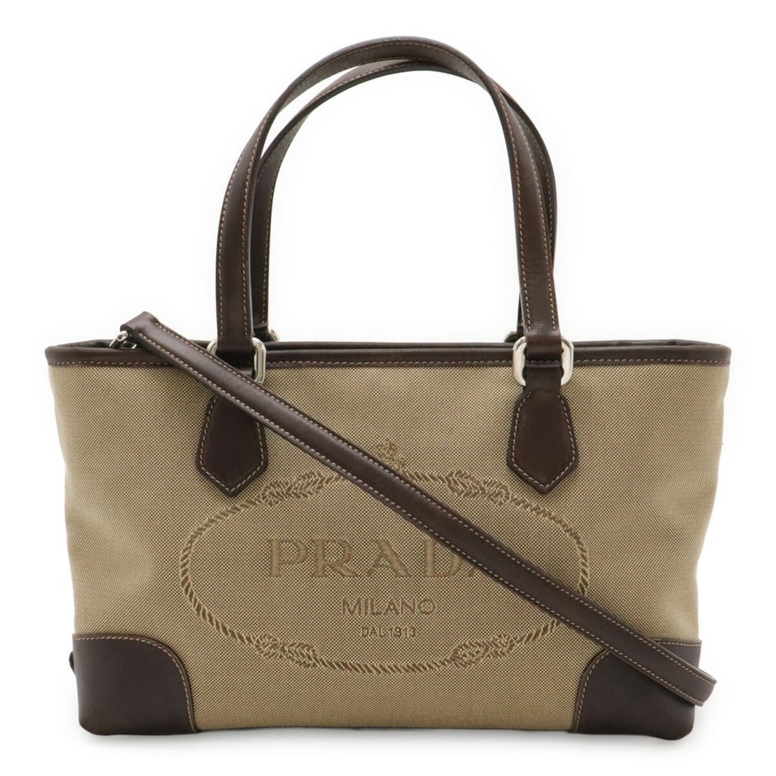 PRADA Jacquard Handbag/Shoulder Bag, Canvas and Leather, Khaki Beige/Dark Brown, BN1159: --- Catalog ---Category: SizeWeight: 530g / 1.16lb.Size (HxWxD): 18cm x 27.5cm x 8cm / 7.08'' x 10.82'' x 3.14''Strap Length: 95cm / 37.4''Category: DesignType: Handbag, Shoulder bagColor: Beige, Dark
