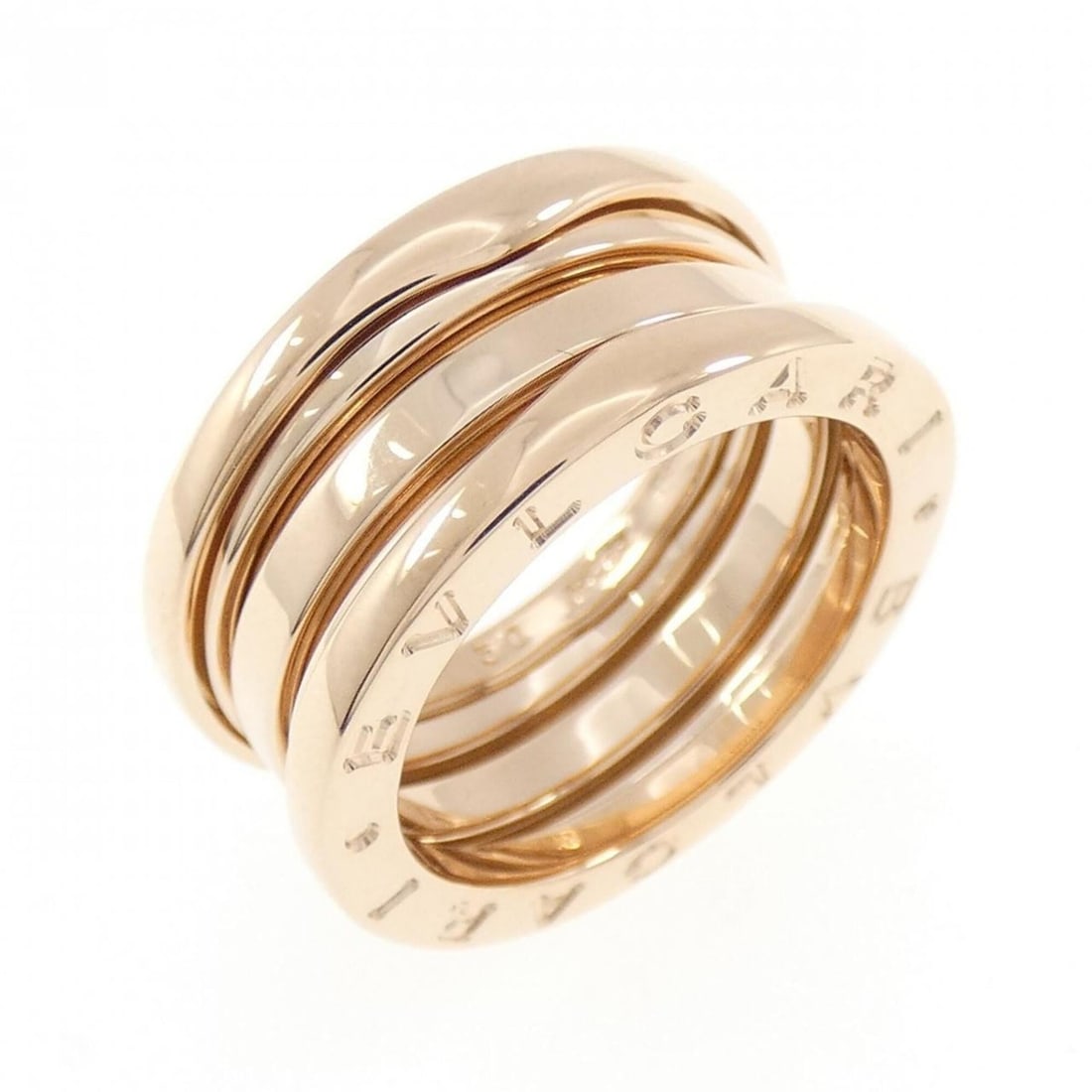 Bvlgari B.zero1 3-band ring: --- Catalog ---Category: SizeUS Size: 5.5Brand Size: 50Category: DesignType: Band ringGender: WomenMaterial: Pink gold (18K)Category: GeneralBrand: Bvlgari--- Item List ---Section: ConditionRanking: