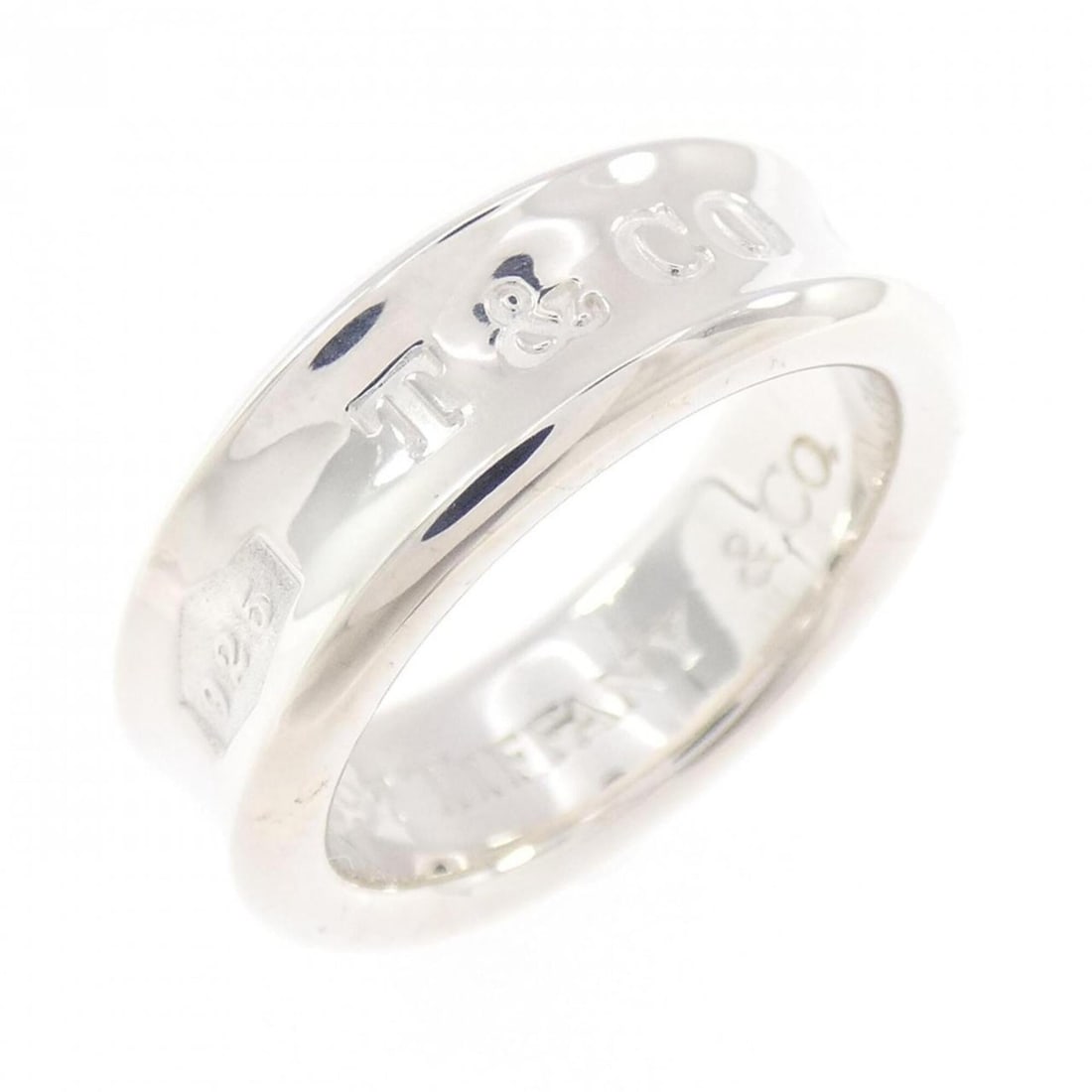 Tiffany 1837 Ring: --- Catalog ---Category: SizeJP Size: 12.0US Size: 6.5Category: DesignType: Band ringGender: WomenMaterial: Silver 925Category: GeneralBrand: Tiffany--- Item List ---Section: ConditionRanking: Rank A