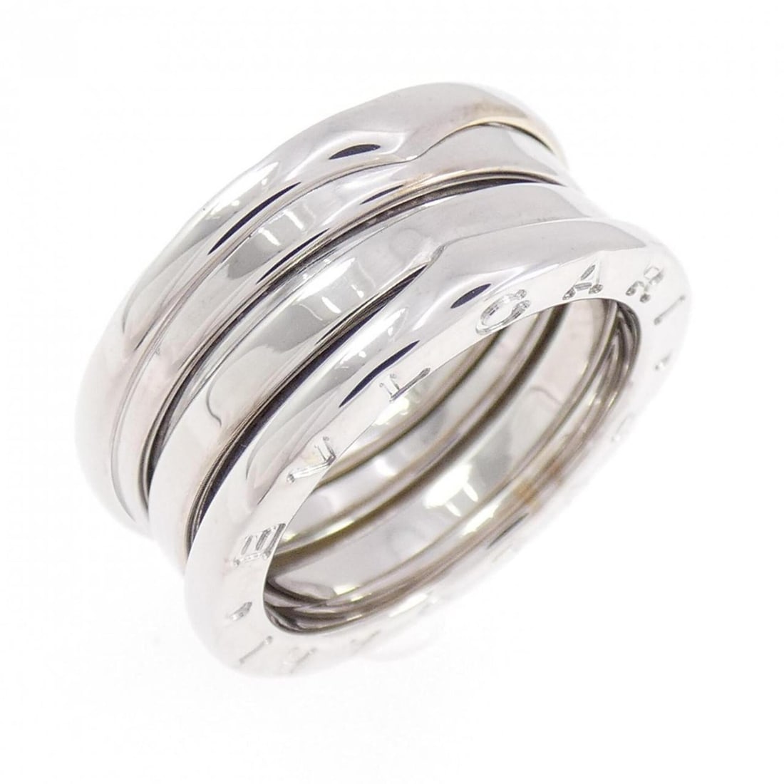 Bvlgari B.zero1 3-band ring: --- Catalog ---Category: SizeUS Size: 5.5Brand Size: 50Category: DesignType: Band ringColor: White goldGender: WomenMaterial: White gold (18K)Category: GeneralBrand: Bvlgari--- Item List ---Section: C