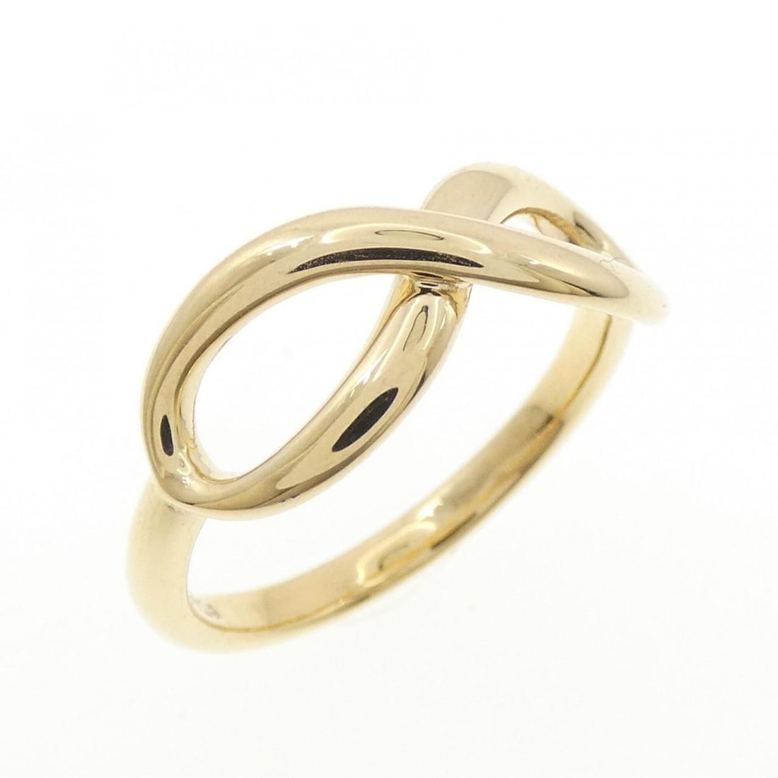 Tiffany Infinity Ring: --- Catalog ---Category: SizeJP Size: 11.0US Size: 6Category: DesignType: Band ringGender: WomenMaterial: Yellow gold (18K)Category: GeneralBrand: Tiffany--- Item List ---Section: ConditionRanking: