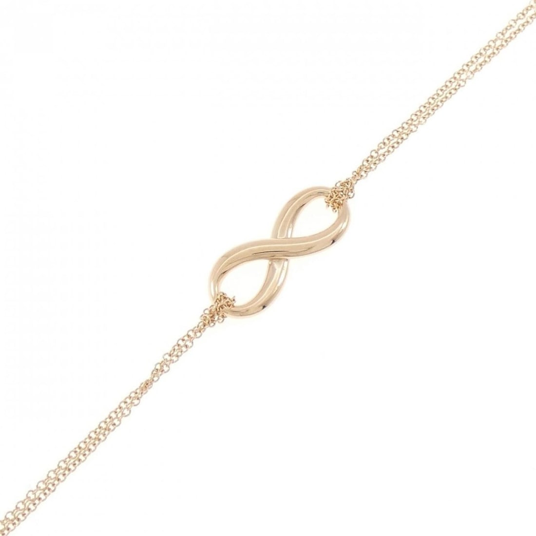 Tiffany Infinity Bracelet: --- Catalog ---Category: SizeLength: 16cm / 6.29''Category: DesignType: Charm braceletColor: Pink goldGender: WomenMaterial: Pink gold (18K)Category: GeneralBrand: Tiffany--- Item List ---Section: