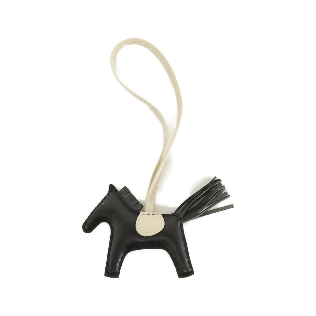 Hermes Rodeo Accessory Bag Charm PM 064929CA: --- Catalog ---Category: SizeChain Length: 370.00mm / 14.57''Size (HxWxD): 75.00mm x 85.00mm / 2.95'' x 3.35''Category: DesignType: Handbag charmColor: Black, VertGender: Men,WomenMaterial: Agneau Mil