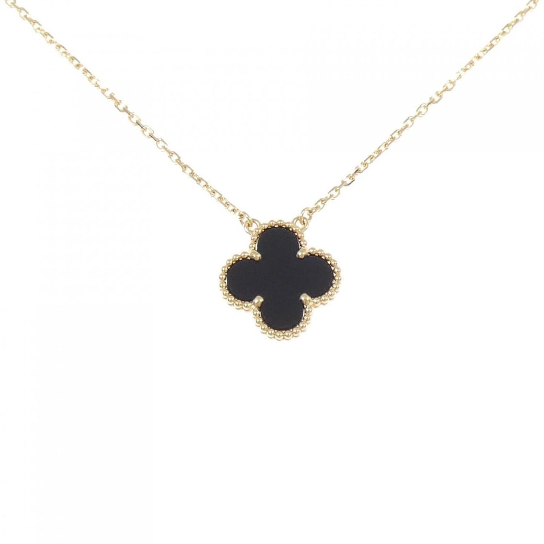 Van Cleef & Arpels Vintage Alhambra Necklace: --- Catalog ---Category: SizePendant Size: 14.9mm x 14.9mm / 0.58'' x 0.58''Neck Circumference: 41 cm - 46 cm / 16.14'' - 18.11''Category: DesignColor: Yellow goldStone: OnyxGender: WomenMaterial: Yel