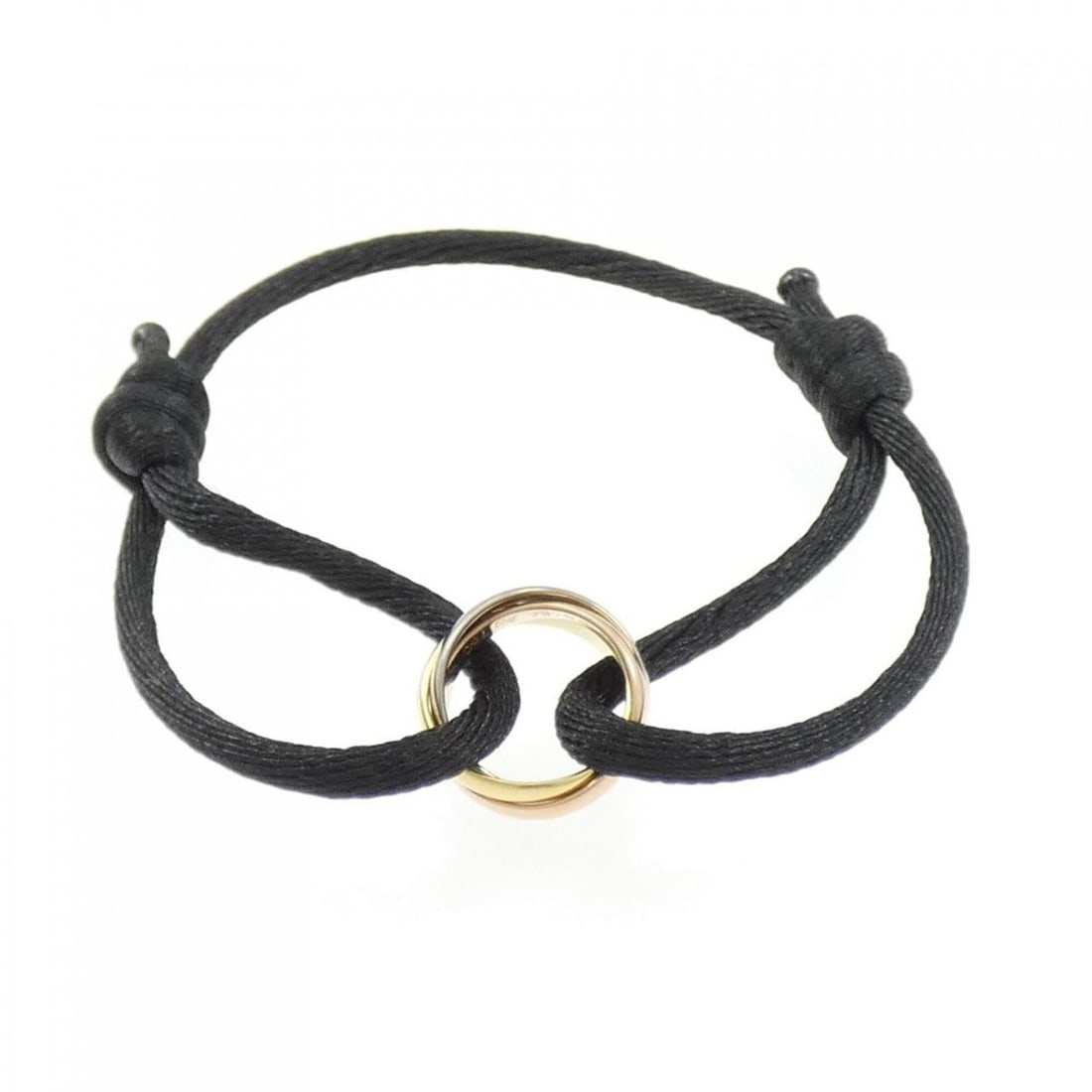 Cartier Trinity Cord Bracelet: --- Catalog ---Category: SizeWidth: 4.3mm / 0.16''Category: DesignType: Charm braceletColor: Pink gold, White gold, Yellow goldGender: WomenMaterial: Pink gold (18K), White gold (18K), Yellow gold (18