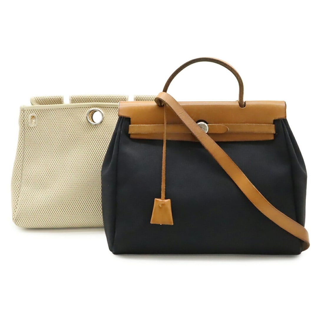 HERMES Herbag PM handbag/shoulder bag, Toile Officier, GM leather, black/beige, ?G stamp: --- Catalog ---Category: SizeSize (HxWxD): 26.5cm x 30.5cm x 11cm / 10.43'' x 12'' x 4.33''Category: DesignType: Handbag, Shoulder bagColor: Beige, BlackGender: WomenMaterial: Toile officier Category: