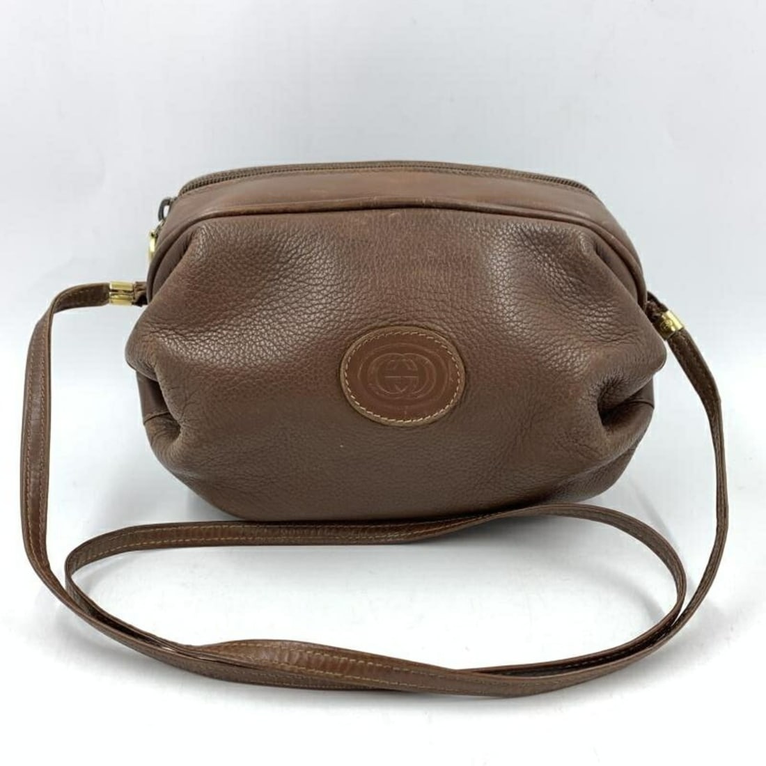 GUCCI Old Gucci Candy Leather Shoulder Bag Brown 007.115.0086: --- Catalog ---Category: SizeSize (HxWxD): 13cm x 20cm x 11.5cm / 5.11'' x 7.87'' x 4.52''Category: DesignType: Shoulder bagColor: BrownGender: WomenMaterial: Leather Category: GeneralMPN: 007.115.008