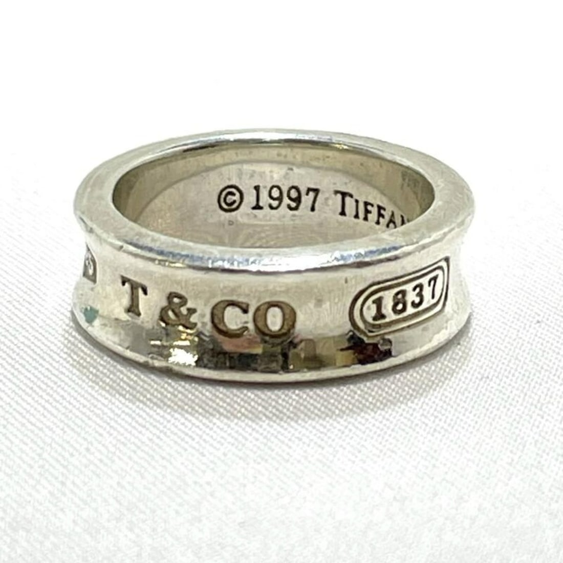 Tiffany & Co. Narrow Ring, Sterling Silver (SV925): --- Catalog ---Category: SizeJP Size: 12US Size: 6.5Category: DesignColor: SilverGender: WomenMaterial: Silver 925Category: GeneralBrand: Tiffany--- Item List ---Section: ConditionRanking: Rank AB