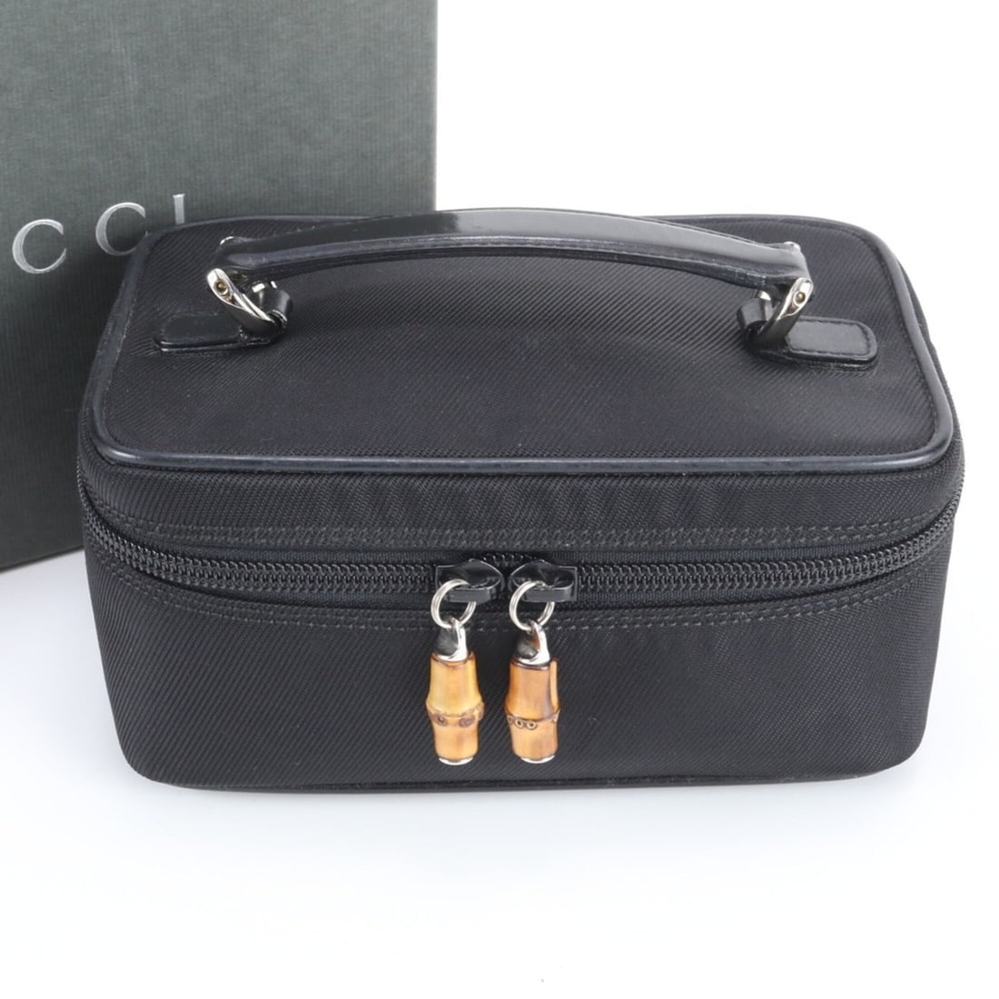 Gucci Bamboo Vanity Leather Nylon Handbag, Black, Brand Name, Women's: --- Catalog ---Category: SizeSize (HxWxD): 8cm x 17cm x 10cm / 3.14'' x 6.69'' x 3.93''Category: DesignType: HandbagColor: BlackGender: WomenMaterial: Nylon , Leather Category: GeneralBrand: GucciCoun