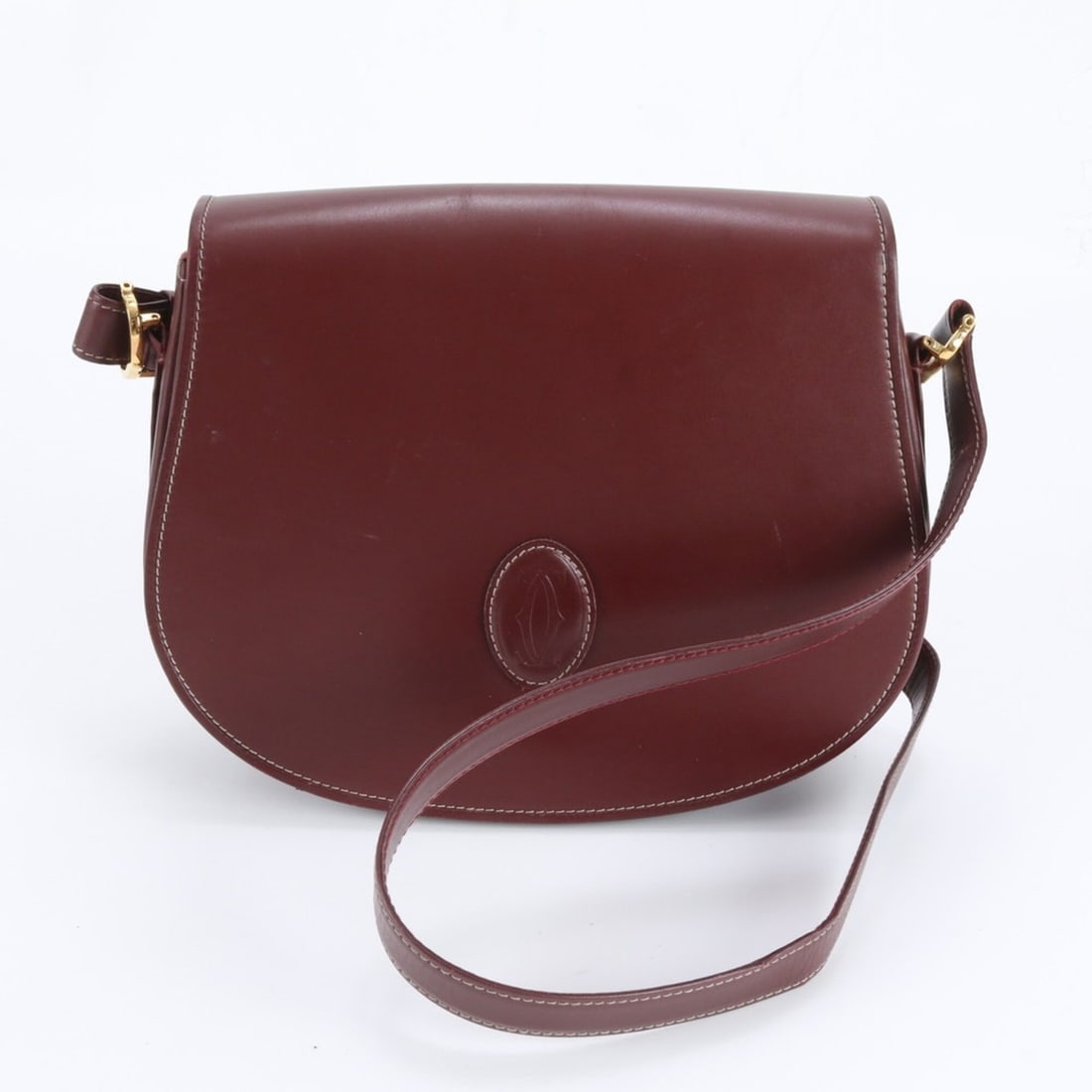 Cartier Must Line Leather Shoulder Bag, Crossbody Brand Name, Women's: --- Catalog ---Category: SizeSize (HxWxD): 18cm x 28cm x 8cm / 7.08'' x 11.02'' x 3.14''Category: DesignType: Shoulder bagColor: Wine redGender: WomenMaterial: Leather Category: GeneralBrand: Cartier-