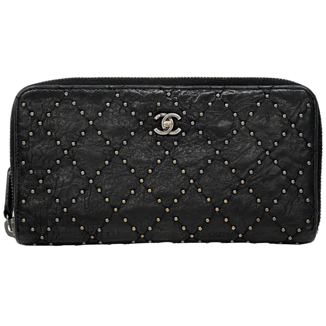 Chanel Matelassé Studded Long Wallet for Women - Black Leather with Silver Hardware, Turn-Lock: --- Catalog ---Category: SizeSize (HxWxD): 10cm x 19cm x 2cm / 3.93'' x 7.48'' x 0.78''Category: DesignColor: BlackGender: WomenMaterial: Leather Category: GeneralBrand: ChanelCountry of Origin: Italy