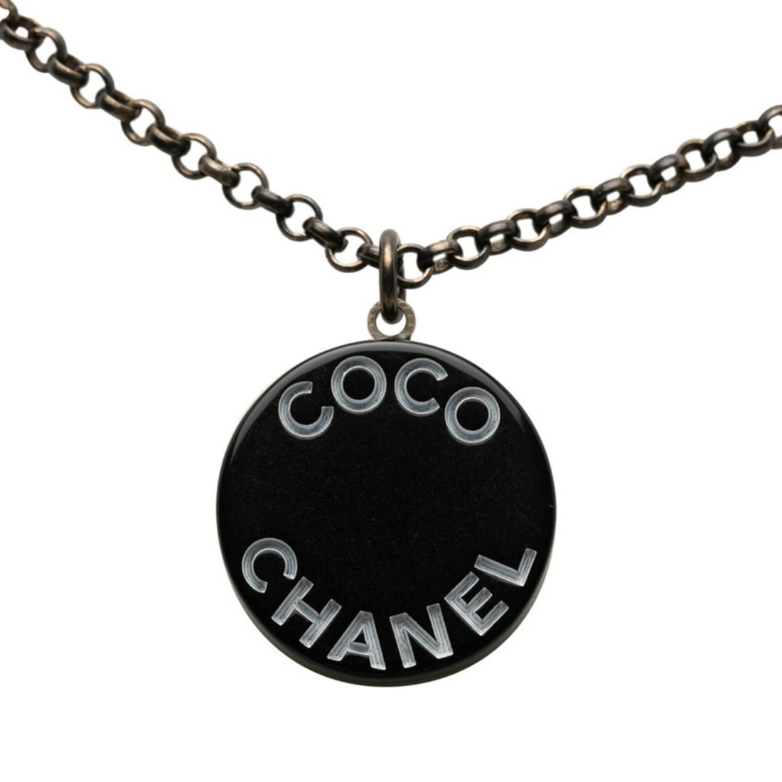Chanel Coco Mark Chain Round Pendant Necklace, 07P Engraving, Black Plastic, Women's.: --- Catalog ---Category: SizePendant Size: 22.1mm x 19.2mm / 0.87'' x 0.75''Neck Circumference: 49 cm / 19.29''Category: DesignGender: WomenMaterial: PlasticPendant Type: PendantNecklace Type: Necklac