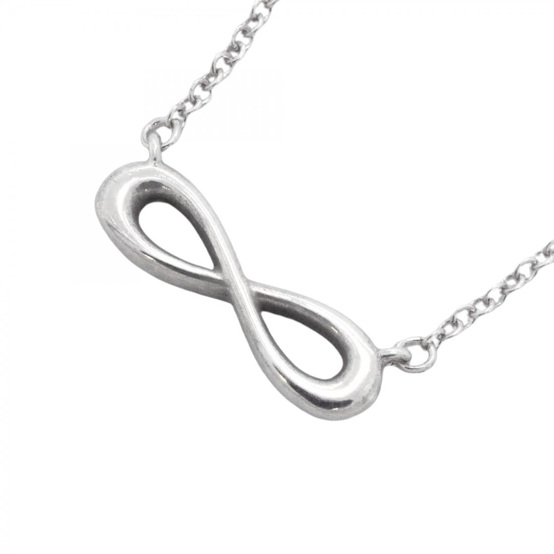 Tiffany & Co. Infinity Necklace, Sterling Silver 925, Women's: --- Catalog ---Category: SizePendant Size: 4.7mm x 14.5mm / 0.18'' x 0.57''Neck Circumference: 41.5 cm - 46.5 cm / 16.33'' - 18.3''Category: DesignGender: WomenMaterial: Silver 925Necklace Type: Neckl
