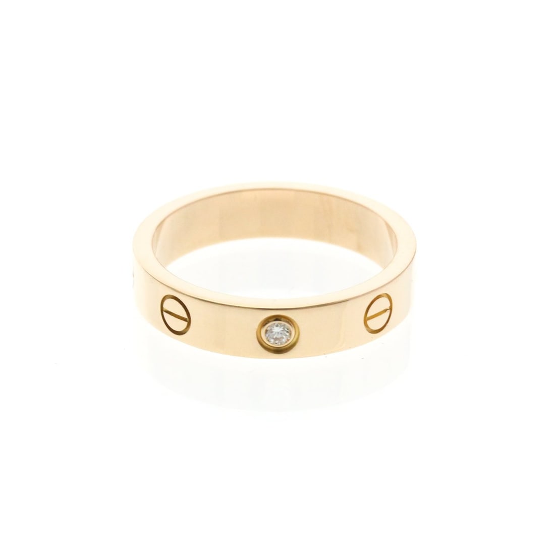 Cartier Mini Love Ring With 1 Diamond Pink Gold (18K) Fashion Diamond Band Ring Pink Gold: --- Catalog ---Category: SizeWidth: 4mm / 0.16''Weight: 4.5g / 0.15oz.JP Size: 12US Size: 6Brand Size: 52Category: DesignType: Band ringColor: Pink goldMetal: GoldStone: DiamondStyle: FashionGender: M