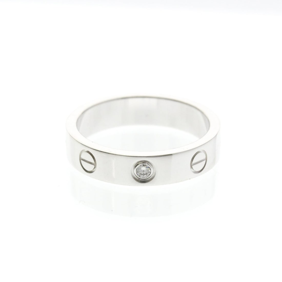 Cartier Mini Love Ring With 1 Diamond White Gold (18K) Fashion Diamond Band Ring Silver: --- Catalog ---Category: SizeWidth: 4.1mm / 0.16''Weight: 4.6g / 0.16oz.JP Size: 9US Size: 4 3/4Brand Size: 49Category: DesignType: Band ringColor: SilverMetal: White GoldStone: DiamondStyle: FashionG