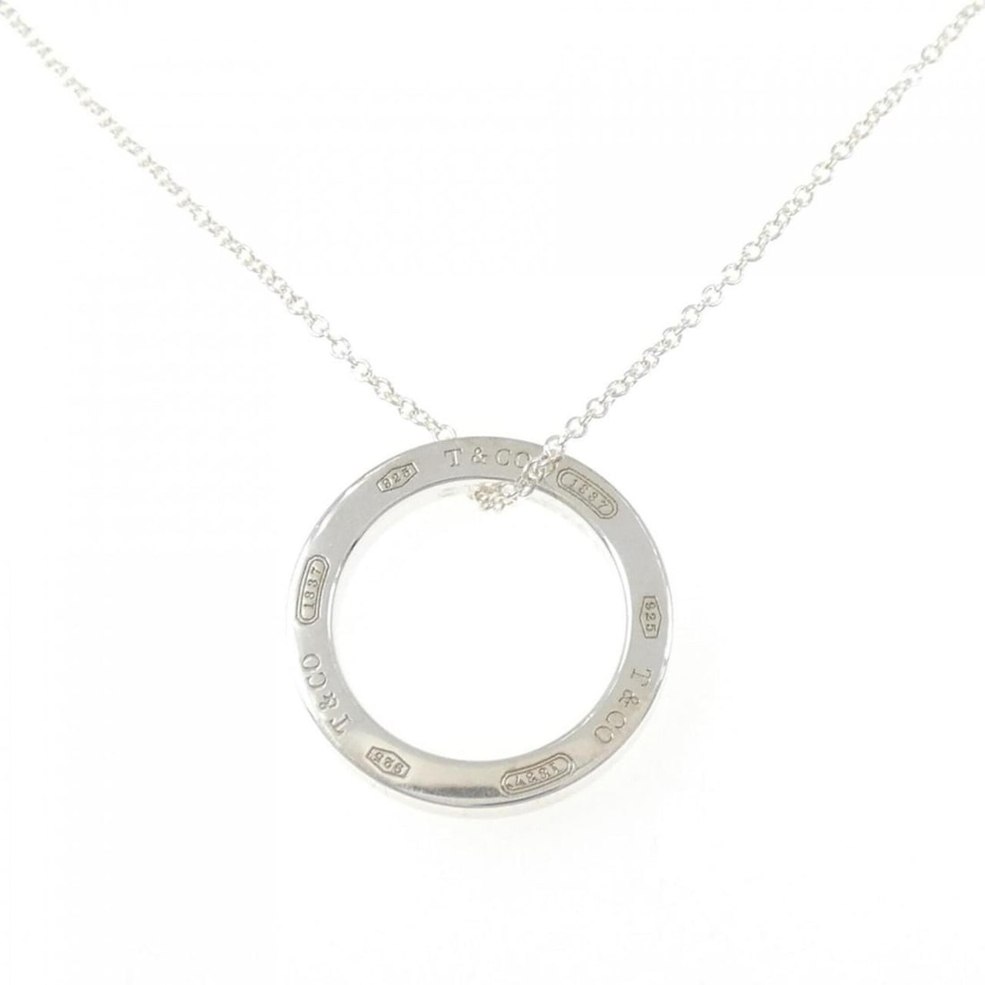 Tiffany & Co. 1837 Circle Necklace: --- Catalog ---Category: SizePendant Size: 17.8mm / 0.7''Neck Circumference: 40 cm / 15.74''Category: DesignGender: WomenMaterial: Silver 925Necklace Type: NecklaceCategory: GeneralMPN: 666Brand: Tiff