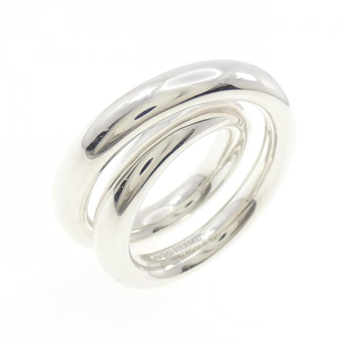 Hermes Vertige Ring: --- Catalog ---Category: SizeUS Size: 5Brand Size: 49Category: DesignType: Band ringGender: WomenMaterial: Silver 925Category: GeneralMPN: H104261BBrand: Hermes--- Item List ---Section: