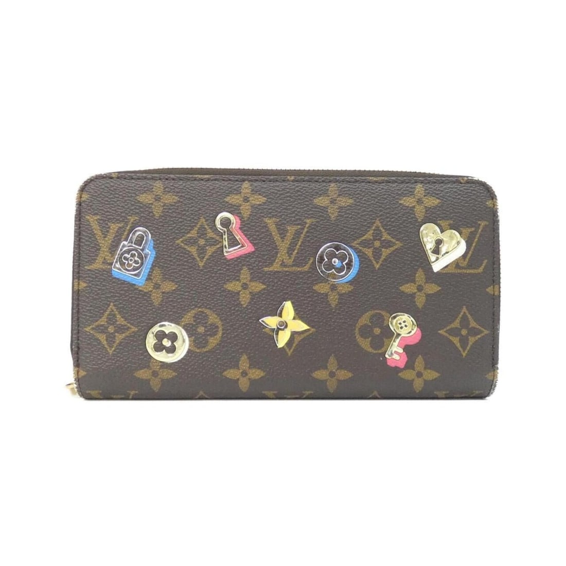 Louis Vuitton Monogram (Love Lock) Zippy Wallet M64116: --- Catalog ---Category: SizeSize (HxWxD): 10cm x 20cm x 2cm / 3.93'' x 7.87'' x 0.78''Category: DesignColor: Marron, MonogramGender: Women,MenMaterial: Coated canvas Category: GeneralMPN: M64116Brand
