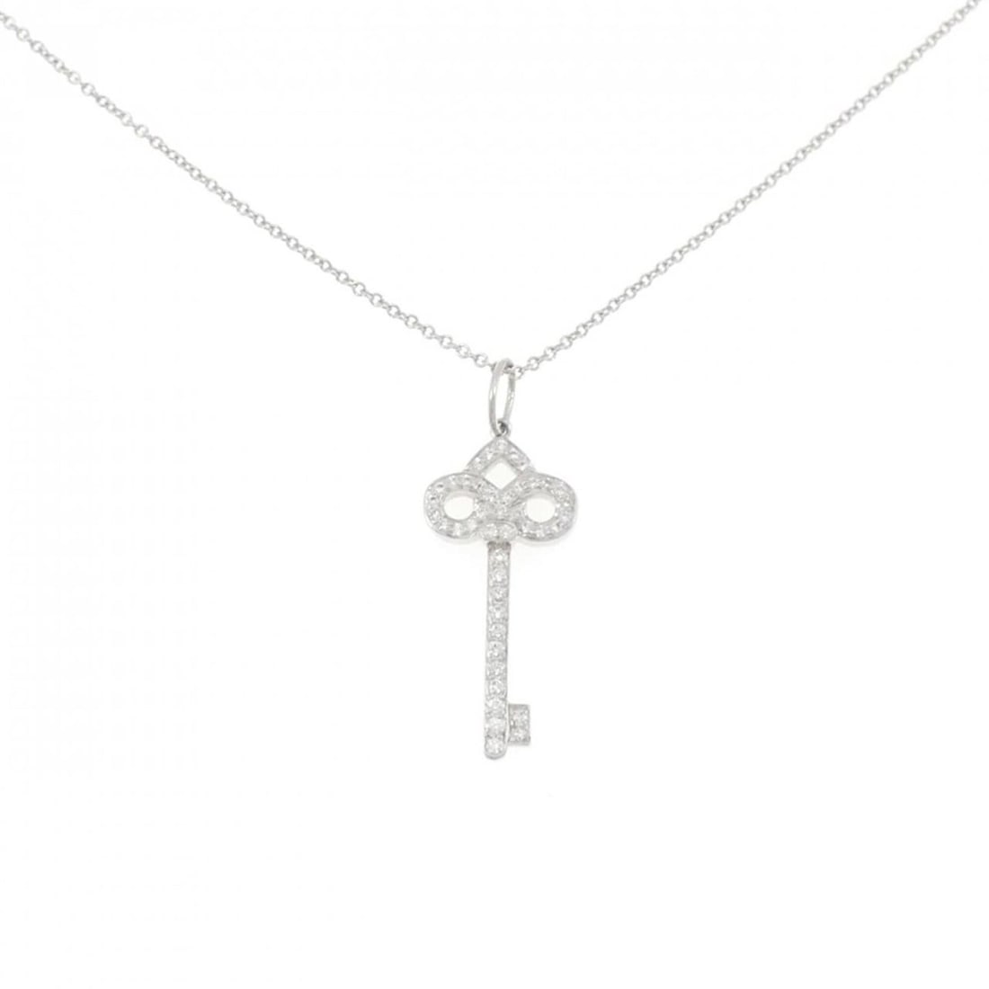 Tiffany & Co. Fleur de Lis Key Necklace: --- Catalog ---Category: SizePendant Size: 27.9mm x 10.6mm / 1.09'' x 0.41''Neck Circumference: 45 cm / 17.71''Category: DesignColor: SilverGender: WomenMaterial: Platinum 950Pendant Type: PendantNeck