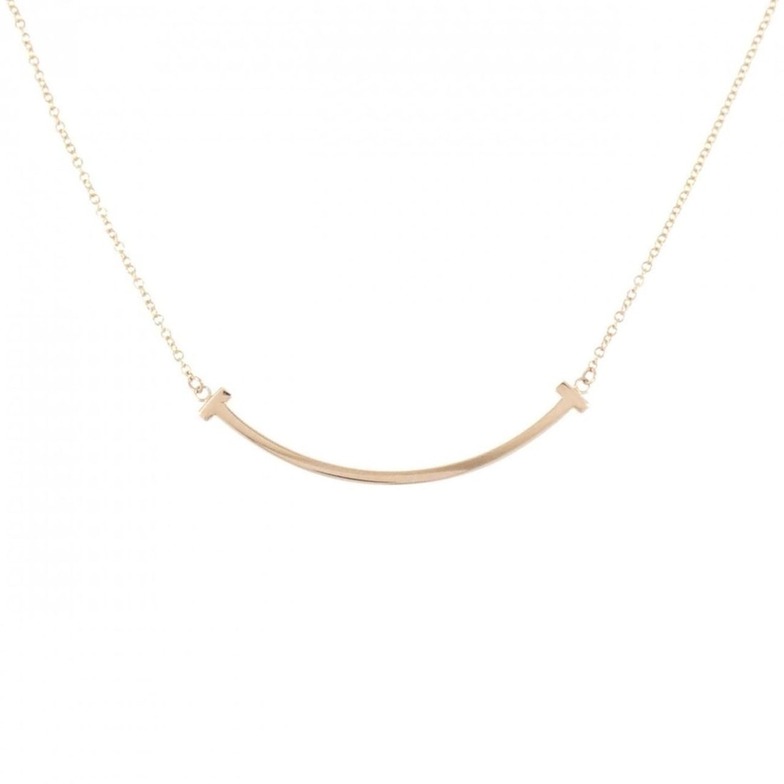 Tiffany T Smile Small Necklace: --- Catalog ---Category: SizePendant Size: 3.6mm x 37mm / 0.14'' x 1.45''Neck Circumference: 41 cm - 46 cm / 16.14'' - 18.11''Category: DesignGender: WomenMaterial: Pink gold (18K)Pendant Type: Pendan