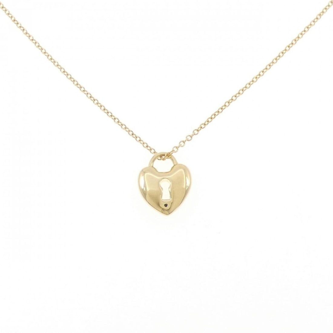 Tiffany Heart Lock Mini Necklace: --- Catalog ---Category: SizePendant Size: 11.1mm x 9.4mm / 0.43'' x 0.37''Neck Circumference: 41 cm / 16.14''Category: DesignColor: Yellow goldGender: WomenMaterial: Yellow gold (18K)Pendant Type: Pe