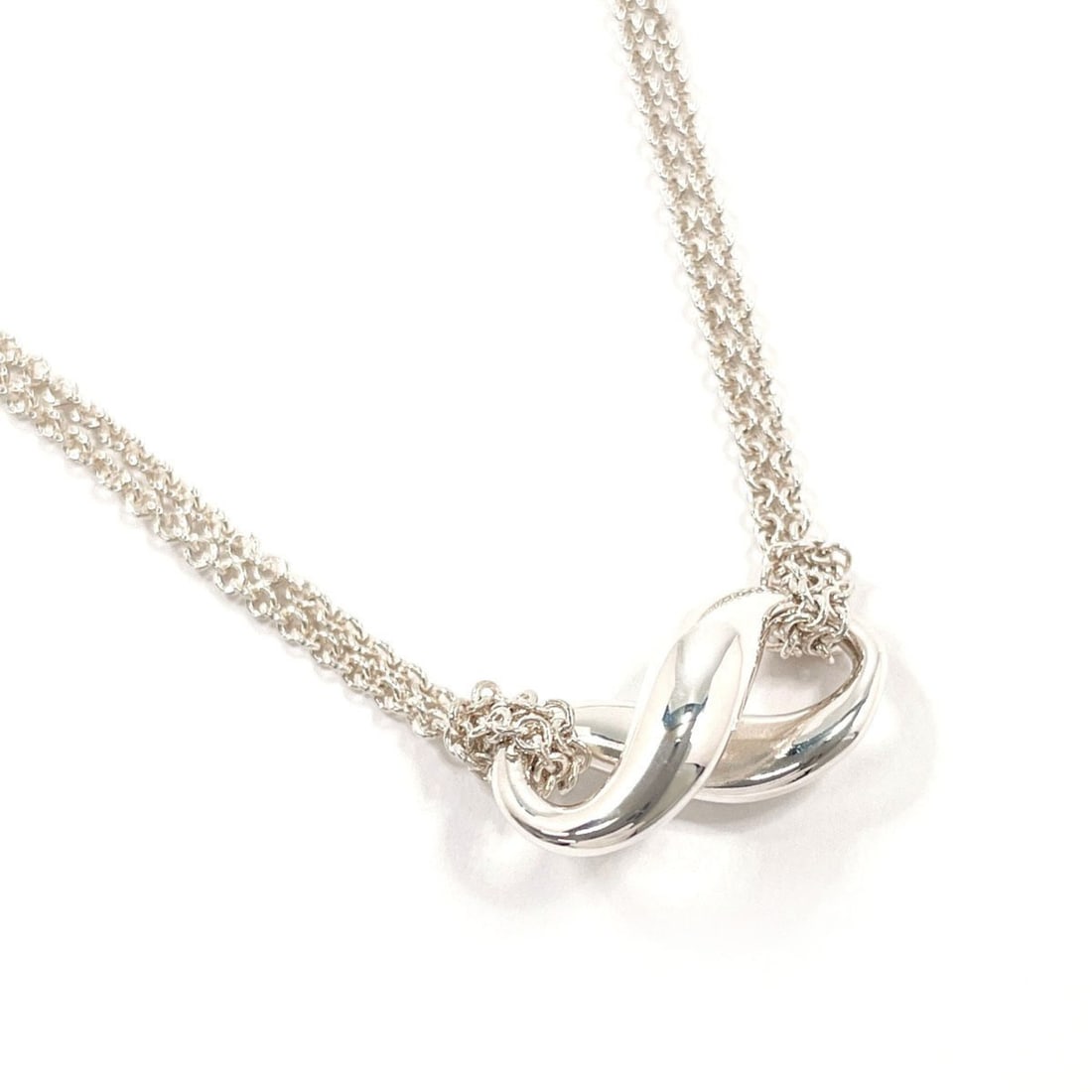TIFFANY&Co. Tiffany Infinity Necklace, Sterling Silver 925, Silver, Women's: --- Catalog ---Category: SizeWeight: 7.5g / 0.26oz.Pendant Size: 9mm x 18.5mm / 0.35'' x 0.72''Neck Circumference: 40 cm / 15.74''Category: DesignColor: SilverGender: WomenMaterial: Silver 925Necklace