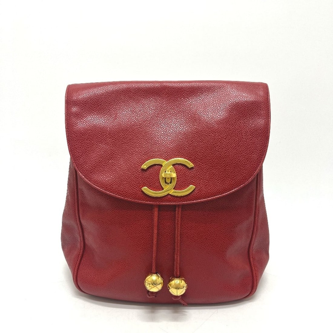 CHANEL Coco Ball Mark Backpack Chain Shoulder Rucksack Bag Caviar Leather Women's Red: --- Catalog ---Category: SizeSize (HxWxD): 26.5cm x 23cm x 12cm / 10.43'' x 9.05'' x 4.72''Category: DesignType: BackpackColor: Red colorGender: WomenMaterial: Grained Calfskin Category: GeneralBrand: