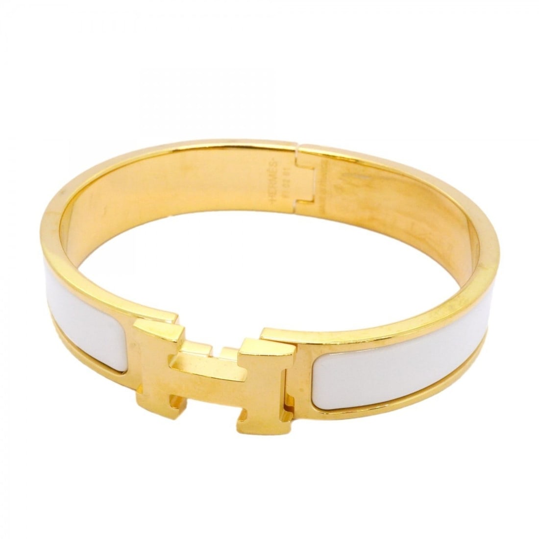 Hermes Bangle Clic Clac PM GP Plated Gold White Women's: --- Catalog ---Category: SizeLength: 15.5cm / 6.1''Category: DesignType: BangleColor: Gold, WhiteGender: WomenMaterial: Gold platingCategory: GeneralBrand: Hermes--- Item List ---Section: ConditionRan