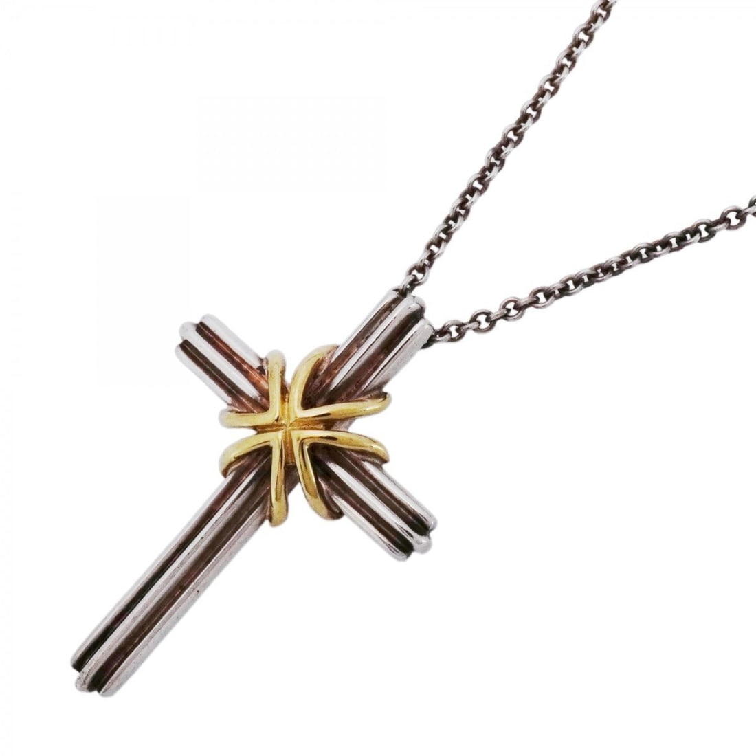 Tiffany & Co. Signature Cross Necklace, 18K Yellow Gold (KYG), Sterling Silver 925, Women's: --- Catalog ---Category: SizePendant Size: 33.4mm x 22.4mm / 1.31'' x 0.88''Neck Circumference: 46 cm / 18.11''Category: DesignGender: WomenMaterial: Silver 925, Yellow gold (18K)Necklace Type: Neckla