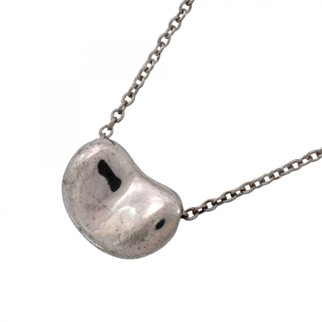Tiffany & Co. Bean Necklace, Sterling Silver 925, Women's: --- Catalog ---Category: SizePendant Size: 7.8mm x 10.9mm / 0.3'' x 0.42''Neck Circumference: 43 cm / 16.92''Category: DesignGender: WomenMaterial: Silver 925Necklace Type: NecklaceCategory: GeneralBr