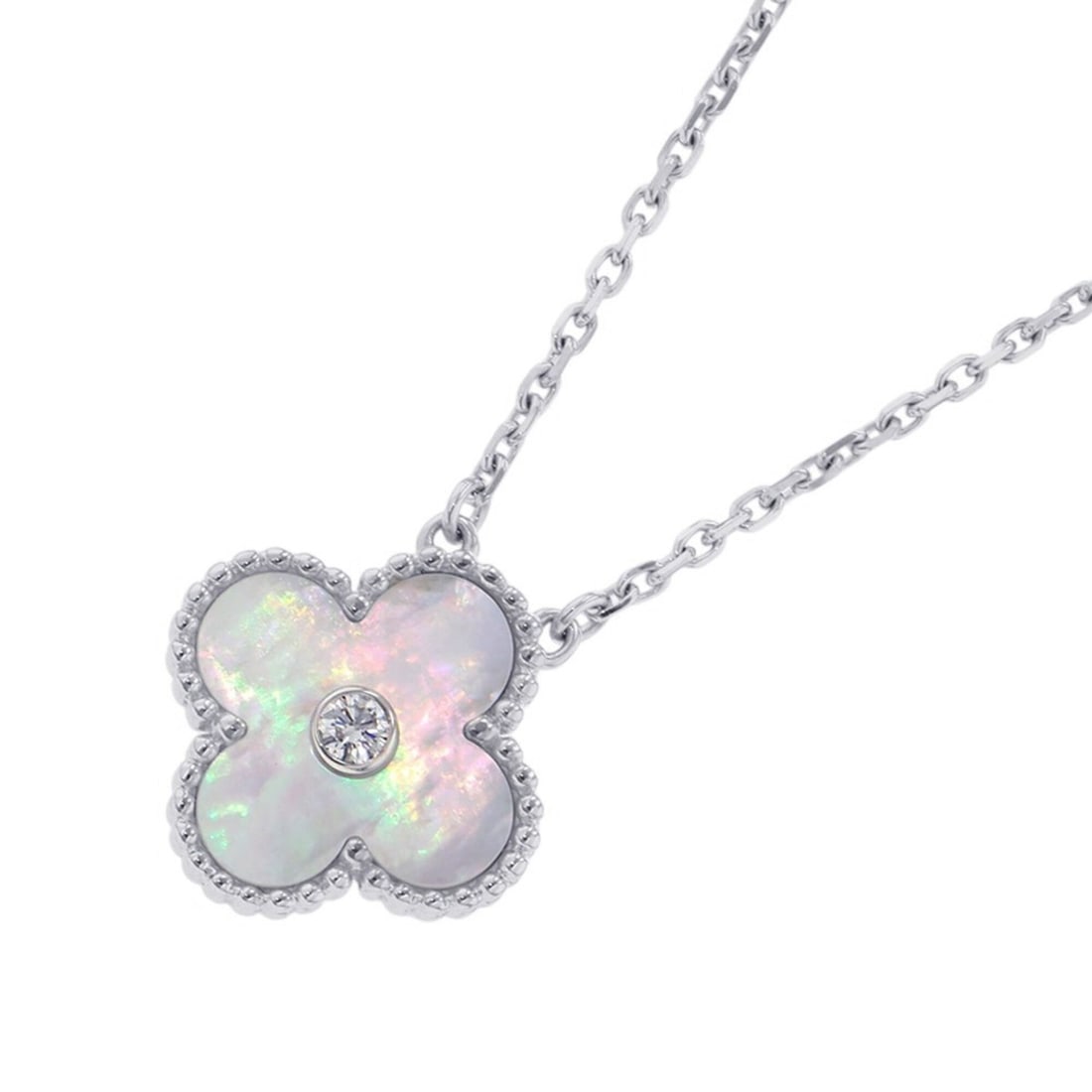 Van Cleef & Arpels Alhambra Necklace, Mother-of-Pearl, 1 Diamond, 18K White Gold, 2009 Holiday: --- Catalog ---Category: DesignColor: White goldGender: WomenMaterial: White gold (18K)Necklace Type: NecklaceCategory: GeneralBrand: Van Cleef & Arpels--- Item List ---Section: ConditionRanking: Rank