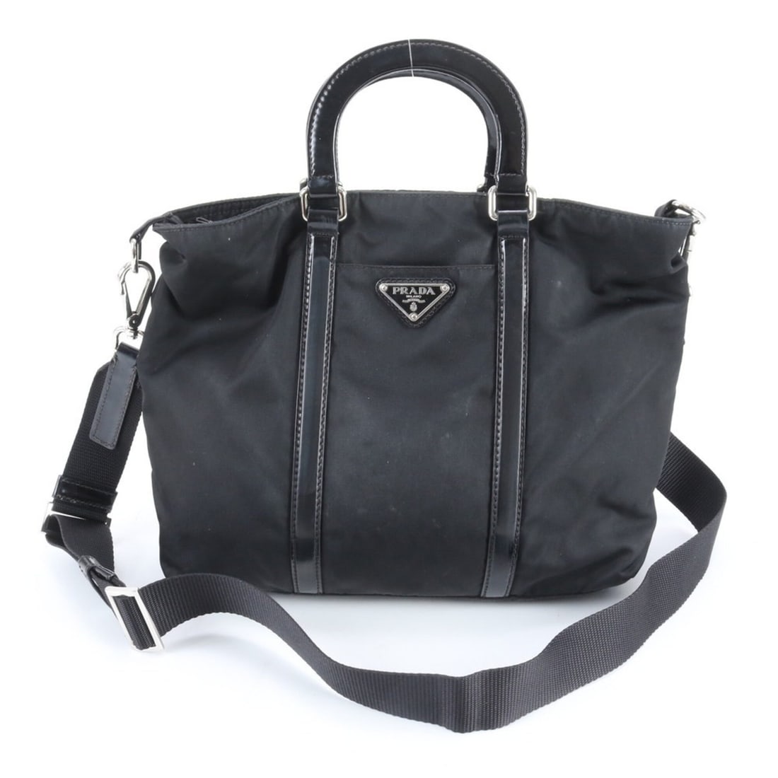 Prada Tessuto Nylon Triangle Logo Leather 2-Way Shoulder Bag/Crossbody Tote Bag for Women: --- Catalog ---Category: SizeSize (HxWxD): 23cm x 27cm x 10cm / 9.05'' x 10.62'' x 3.93''Category: DesignType: Shoulder bag, Tote bagColor: BlackGender: WomenMaterial: Leather , Nylon Category: Genera