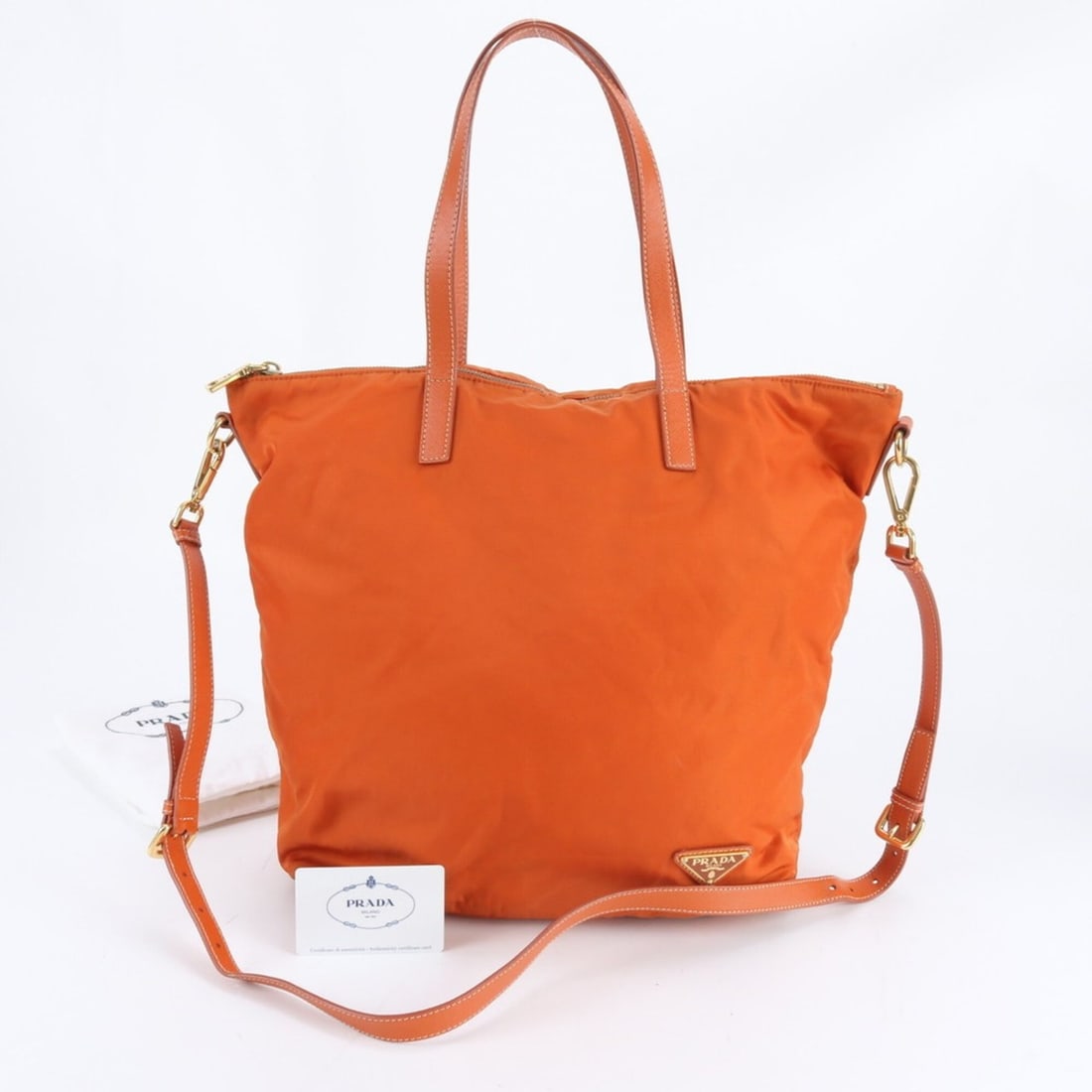 Prada Tessuto Nylon Triangle Logo BR4696 Leather 2-Way Shoulder Bag (Crossbody) for Women, with: --- Catalog ---Category: SizeSize (HxWxD): 34cm x 31cm x 12cm / 13.38'' x 12.2'' x 4.72''Category: DesignType: Shoulder bagColor: OrangeGender: WomenMaterial: Nylon , Leather Category: GeneralMPN: BR4