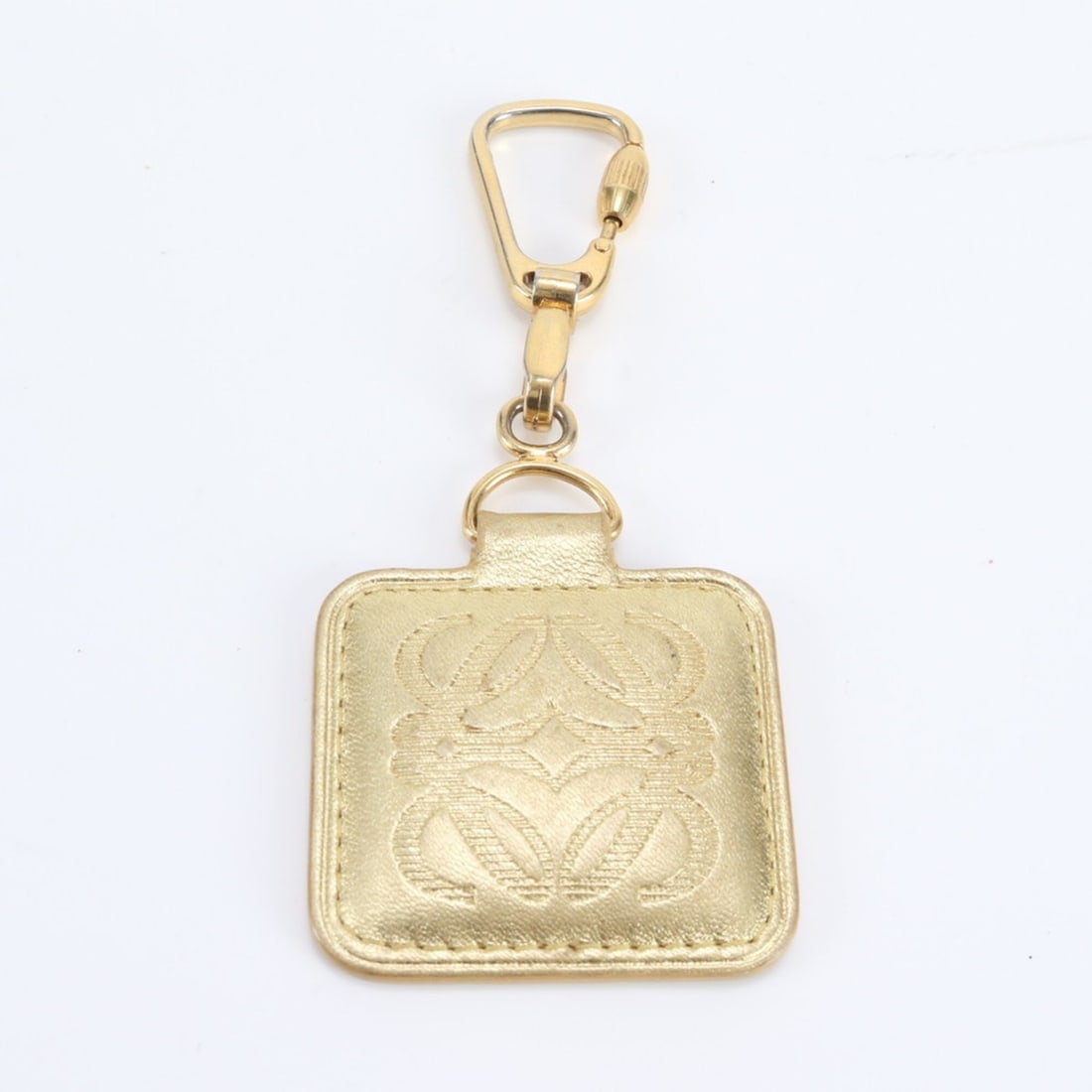 Loewe Anagram Leather Accessory Bag Charm Keychain Strap Gold Women's: --- Catalog ---Category: SizeSize (HxWxD): 5cm x 5cm / 1.96'' x 1.96''Category: DesignType: KeyringColor: GoldGender: WomenMaterial: LeatherCategory: GeneralBrand: LoeweCountry of Origin: Spain--- Ite