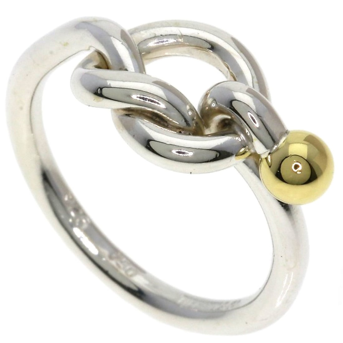Tiffany & Co. Love Knot Ring, Silver/18K Yellow Gold, Women's.: --- Catalog ---Category: SizeJP Size: 9.5US Size: 5Category: DesignType: Band ringColor: Silver, Yellow goldGender: WomenMaterial: Silver, Yellow gold (18K)Category: GeneralBrand: Tiffany--- Item List