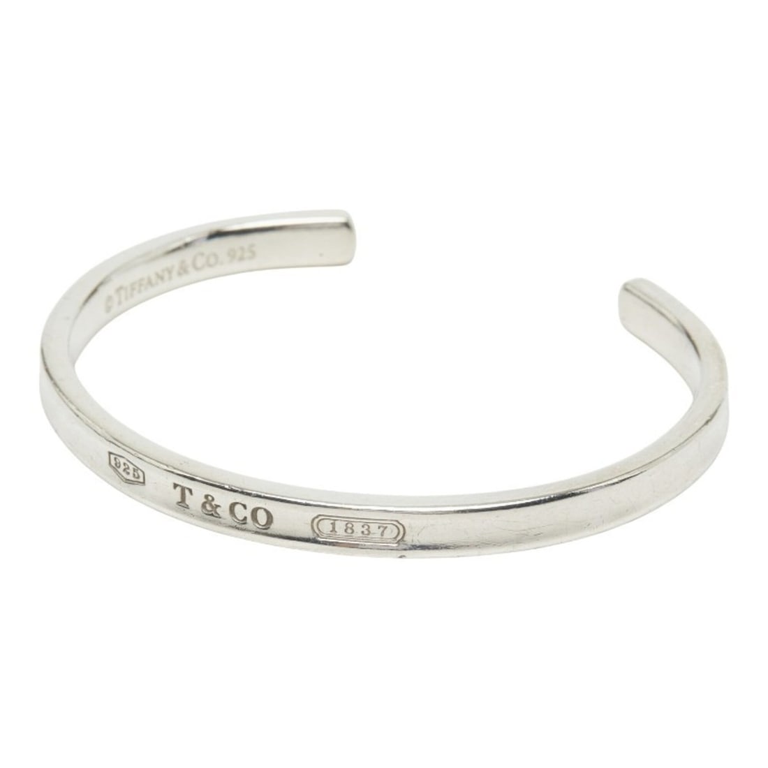 Tiffany & Co. 1837 Cuff Narrow Bangle, SV925 Silver, Women's.: --- Catalog ---Category: SizeLength: 15.5cm / 6.1''Category: DesignType: BangleGender: WomenMaterial: Silver 925Category: GeneralBrand: Tiffany--- Item List ---Section: ConditionRanking: Rank AB Used 