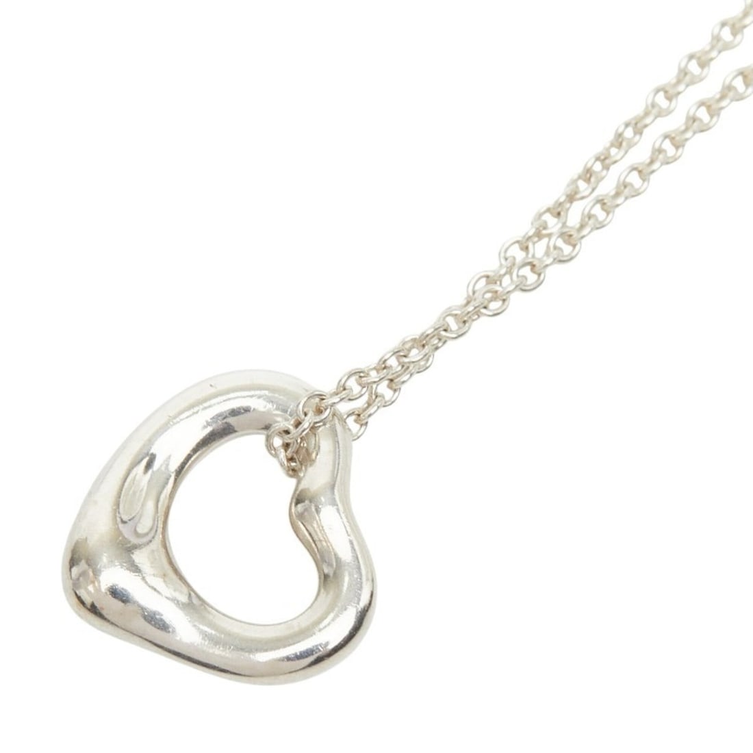 Tiffany & Co. Elsa Peretti Open Heart Chain Pendant Necklace, Sterling Silver (SV925), Women's.: --- Catalog ---Category: SizePendant Size: 10mm x 11mm / 0.39'' x 0.43''Neck Circumference: 41 cm / 16.14''Category: DesignColor: SilverGender: WomenMaterial: Silver 925Necklace Type: NecklaceCategory