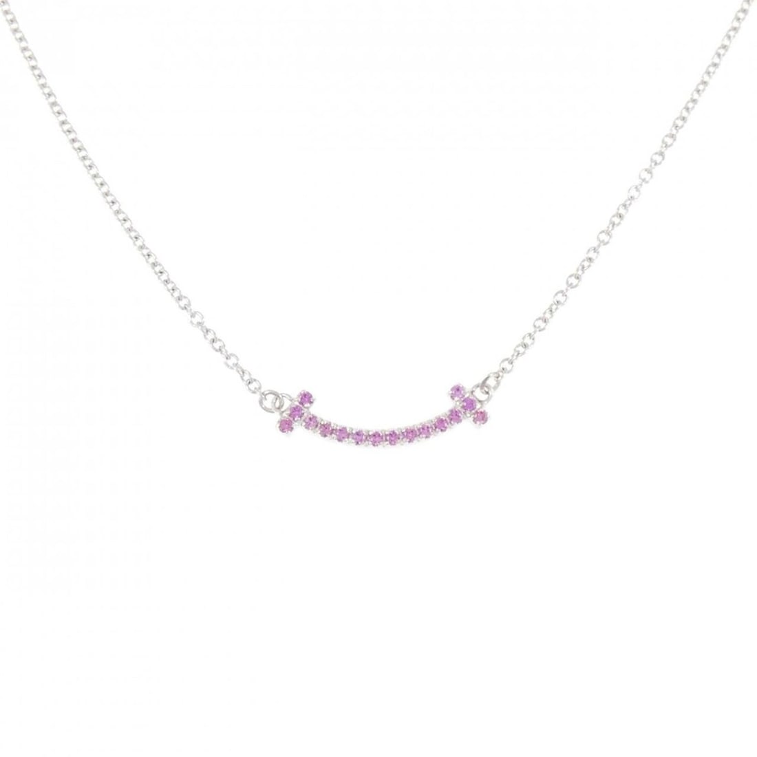 Tiffany T Smile Mini Necklace: --- Catalog ---Category: SizeNeck Circumference: 41 cm - 46 cm / 16.14'' - 18.11''Category: DesignStone: SapphireGender: WomenMaterial: White gold (18K)Pendant Type: PendantNecklace Type: