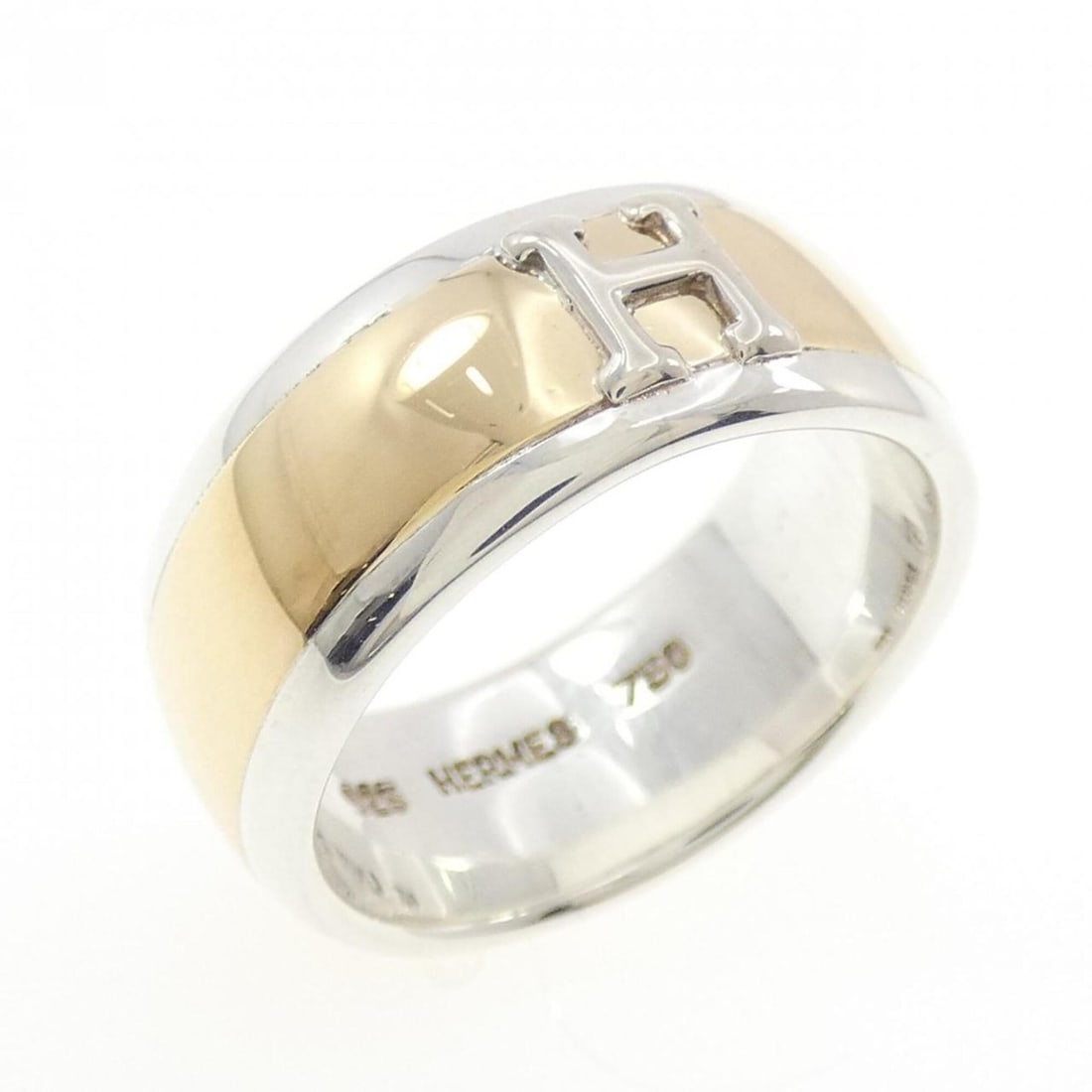 Hermes 925 750YG Ring: --- Catalog ---Category: SizeWidth: 8mm / 0.31''Weight: 8.8g / 0.31oz.JP Size: 13US Size: 6.5Category: DesignType: Band ringColor: YellowMetal: Gold, SilverMetal Purity: 18K, Silver925Category: