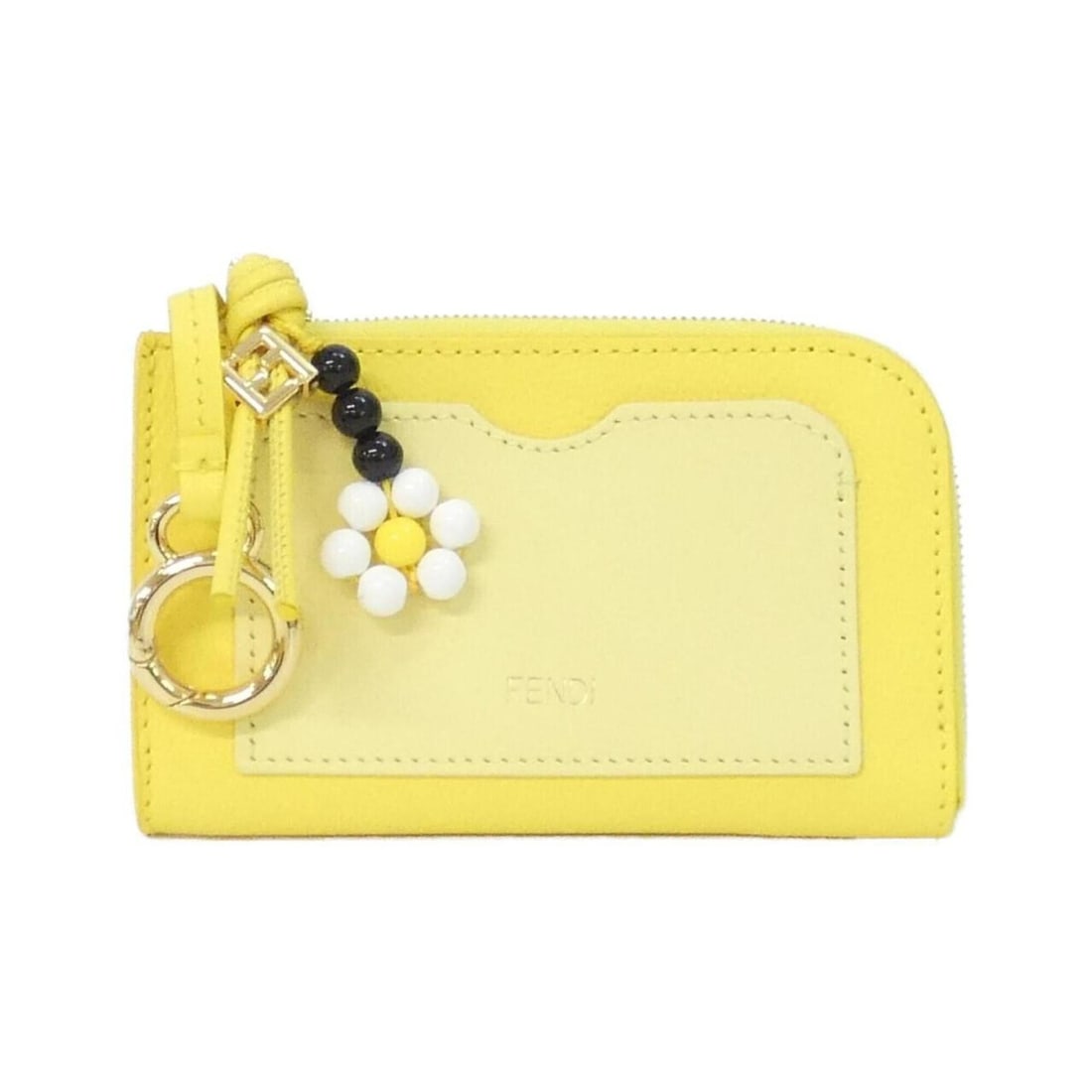 Fendi 8M0558 AWR8 Coin & Key Case: --- Catalog ---Category: SizeSize (HxWxD): 7.5cm x 12.5cm x 1.5cm / 2.95'' x 4.92'' x 0.59''Category: DesignType: Coin purse/coin caseColor: YellowGender: WomenMaterial: Leather Category: