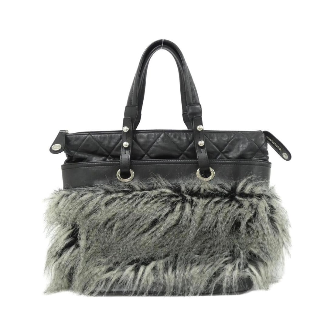 Chanel Paris Biarritz Line Handbag: --- Catalog ---Category: SizeSize (HxWxD): 34cm x 30.5cm x 16.5cm / 13.38'' x 12'' x 6.49''Category: DesignType: HandbagColor: BlackGender: WomenMaterial: Faux fur , Leather Leather/Fur Type:
