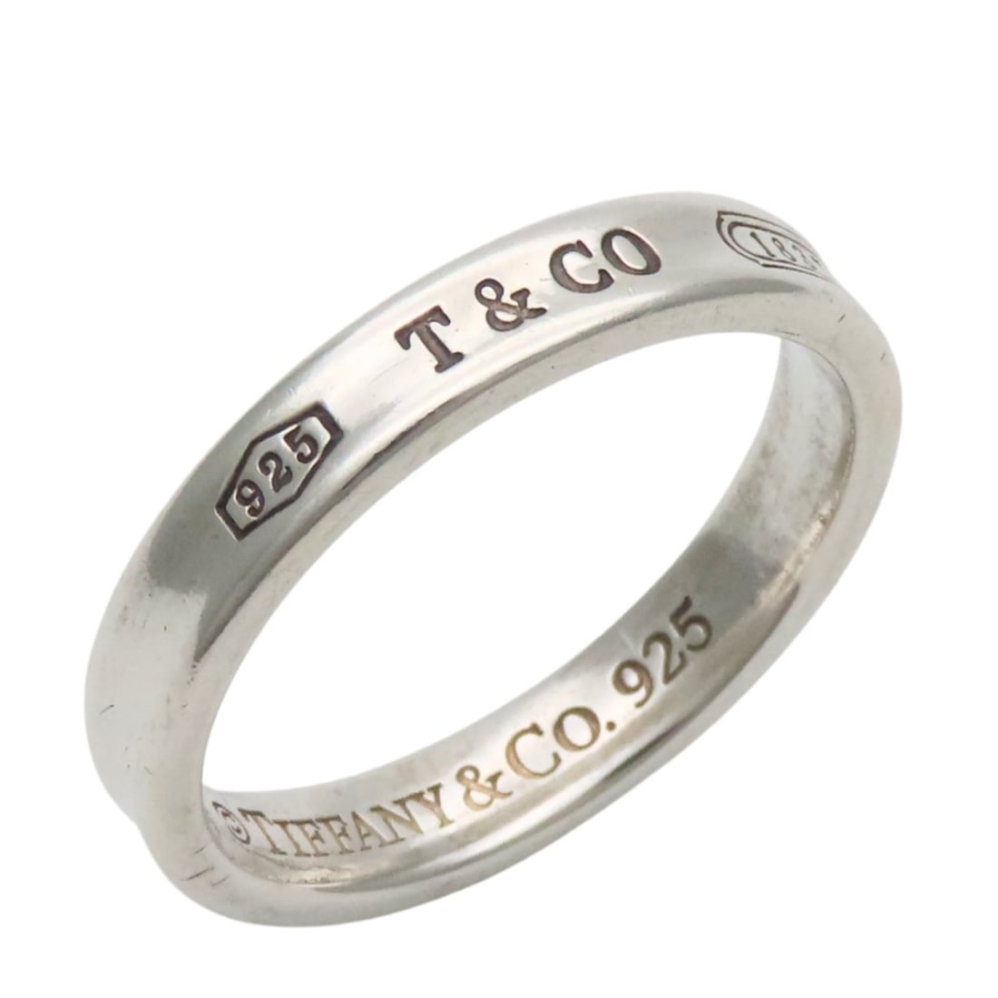 Tiffany & Co. 1837 Narrow Ring, Sterling Silver 925, Approx. 4.39g, Men's.: --- Catalog ---Category: SizeJP Size: 19US Size: 9.5Category: DesignType: Band ringColor: SilverGender: MenMaterial: Silver 925Category: GeneralBrand: Tiffany--- Item List ---Section: ConditionRanking