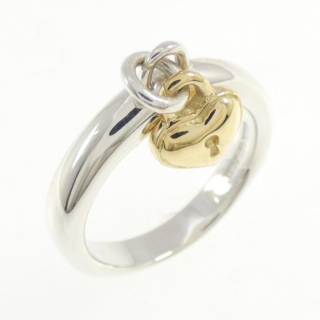 Tiffany & Co. 925 750YG Ring: --- Catalog ---Category: SizeJP Size: 14.0US Size: 7Category: DesignType: Band ringGender: WomenMaterial: Silver 925, Yellow gold (18K)Category: GeneralBrand: Tiffany--- Item List ---Section: