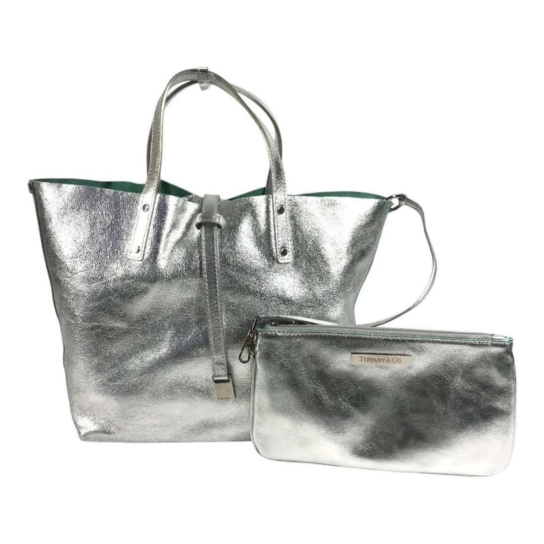 TIFFANY&Co. Tiffany handbag with pouch, logo, reversible bag, tote handbag, leather, men's, women's,: --- Catalog ---Category: SizeSize (HxWxD): 23cm x 23.5cm x 12.5cm / 9.05'' x 9.25'' x 4.92''Category: DesignType: Handbag, Tote bagColor: Blue, SilverGender: Men,WomenMaterial: Leather Category: Gener