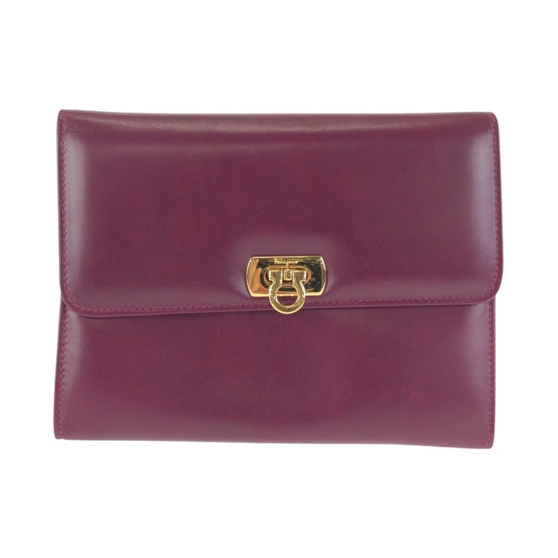 Salvatore Ferragamo Gancini Purple Wine Red Leather Handbag Pouch Clutch Bag 222038 for Women: --- Catalog ---Category: SizeSize (HxWxD): 12cm x 16cm x 4cm / 4.72'' x 6.29'' x 1.57''Category: DesignType: Clutch bag, PouchColor: PurpleGender: WomenMaterial: Leather Category: GeneralMPN: 222038Br
