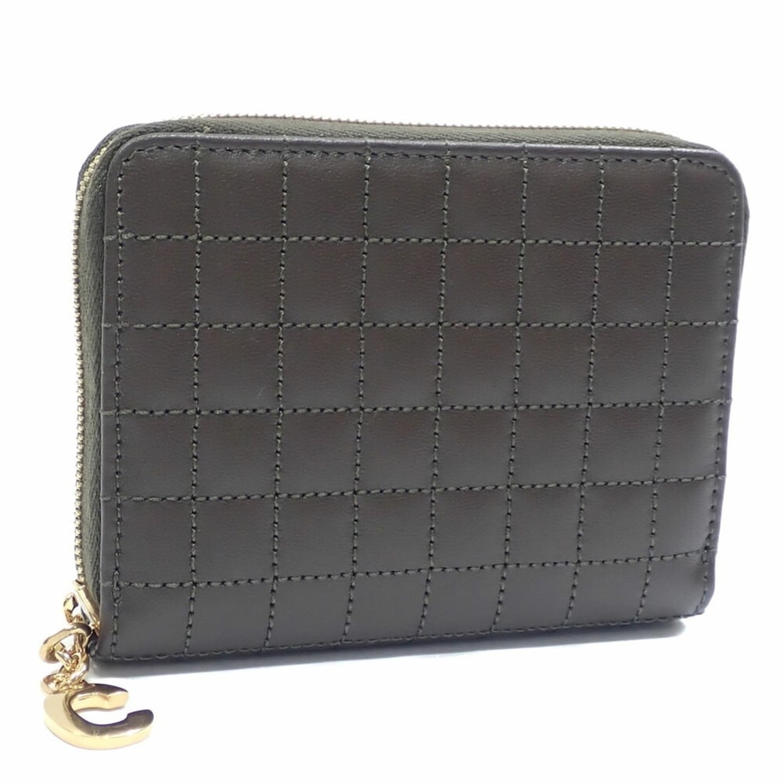 Celine Coin Case Compact Zip Round Wallet for Women, Khaki Leather, 10B663BFL.15KH: --- Catalog ---Category: SizeSize (HxWxD): 8.5cm x 11cm x 1.8cm / 3.34'' x 4.33'' x 0.7''Category: DesignType: Coin purse/coin caseColor: KhakiGender: WomenMaterial: Leather Category: GeneralBrand: Ce