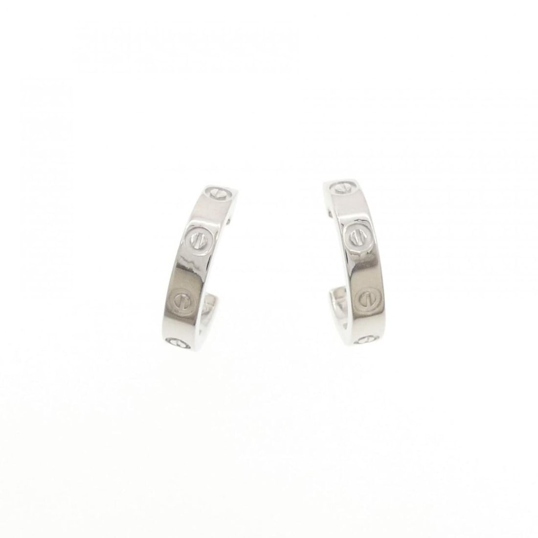 Cartier Mini Love Earrings: --- Catalog ---Category: SizeSize (HxWxD): 12.40mm x 2.60mm / 0.49'' x 0.10''Category: DesignType: Stud earringsGender: WomenMaterial: White gold (18K)Category: GeneralBrand: Cartier--- Item List