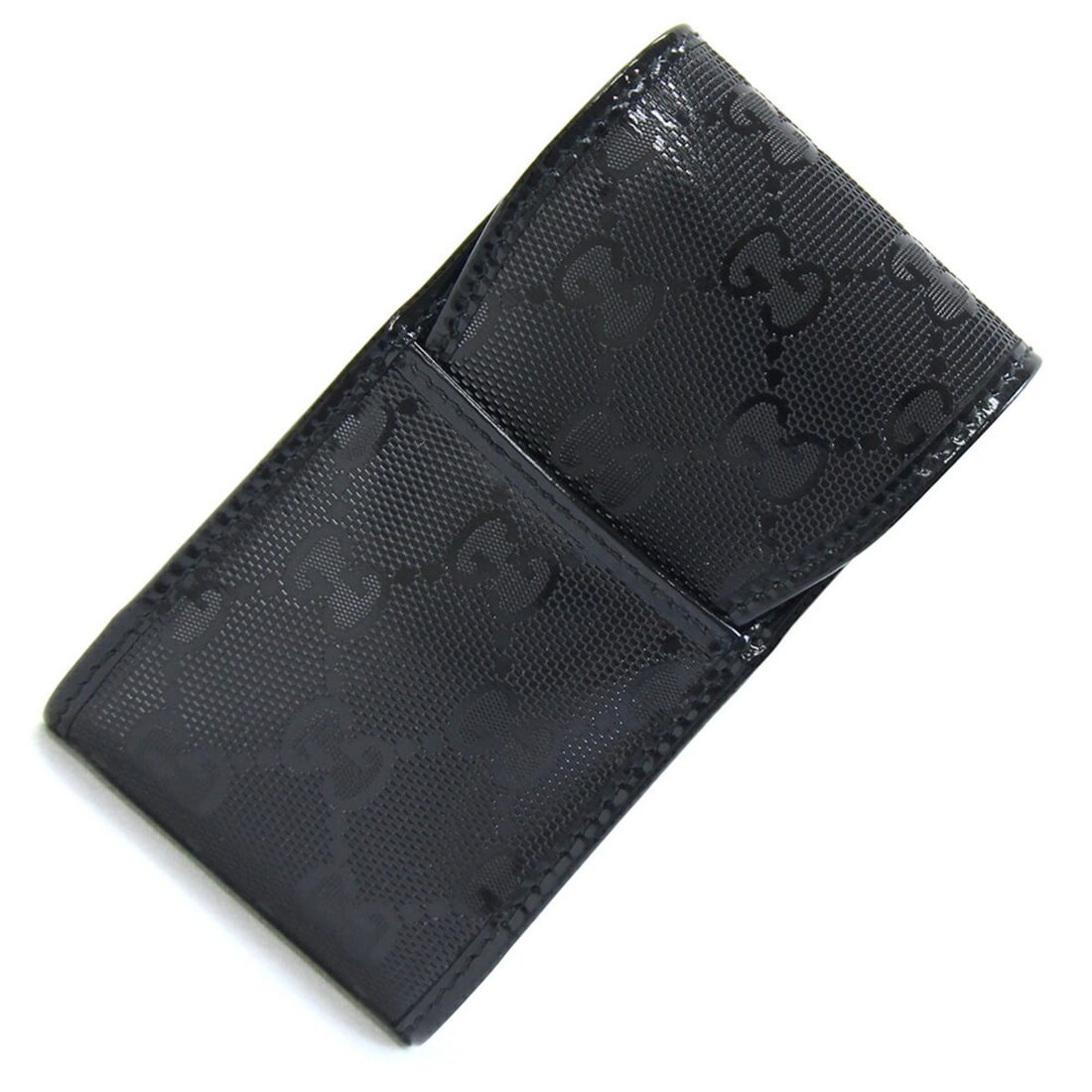 Gucci GG Imprime Cigarette Case 181716 Black Leather Tobacco Handbag Pouch GUCCI: --- Catalog ---Category: DesignType: Cigarette caseColor: BlackMaterial: Leather, PVCCategory: GeneralLine: GG ImpriméBrand: GucciCountry of Origin: ItalyCategory: Physical PropertiesSize (HxWxD): 13