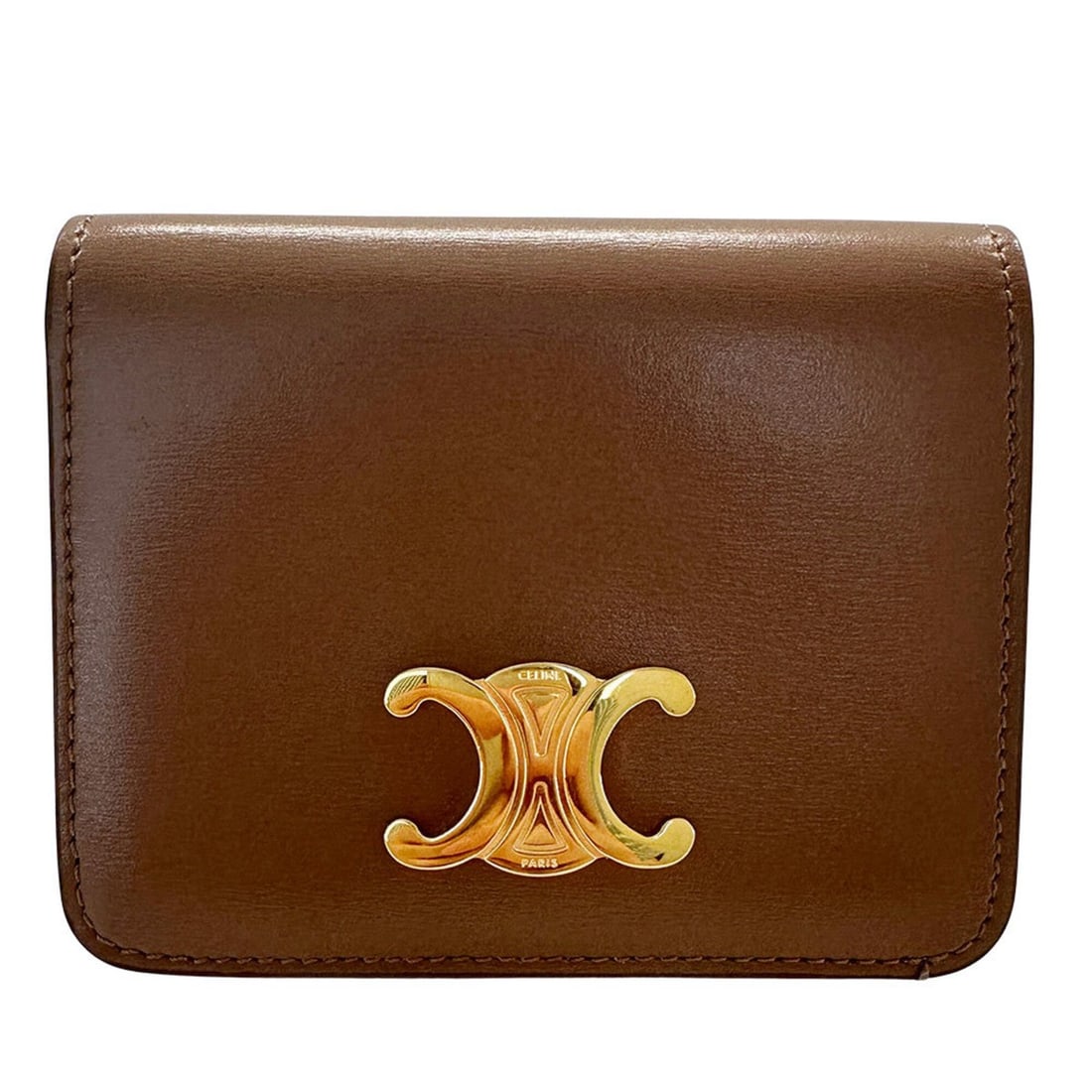 Celine women's wallet, Triomphe design, trifold leather, brown, mini compact.: --- Catalog ---Category: SizeSize (HxWxD): 9cm x 10.5cm x 2.3cm / 3.54'' x 4.13'' x 0.9''Category: DesignType: Wallet (tri-fold)Color: BrownGender: WomenMaterial: Leather Category: GeneralBrand: Celin